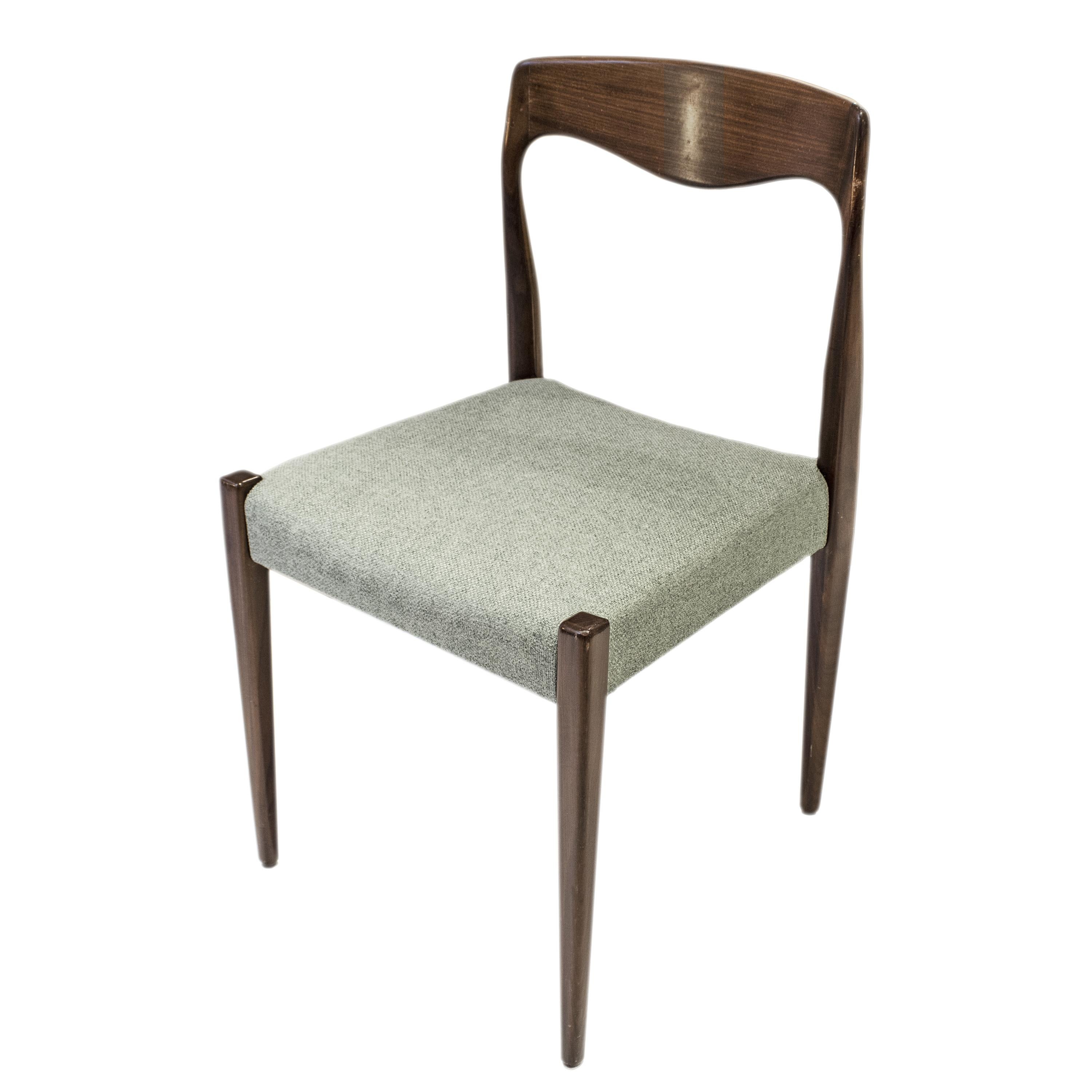 Set of eight Moller-style chairs made in Denmark in the 1960s. The structure of the chair is made entirely of solid wood varnished and the seat is covered in foam, and upholstered in a green cotton fabric.