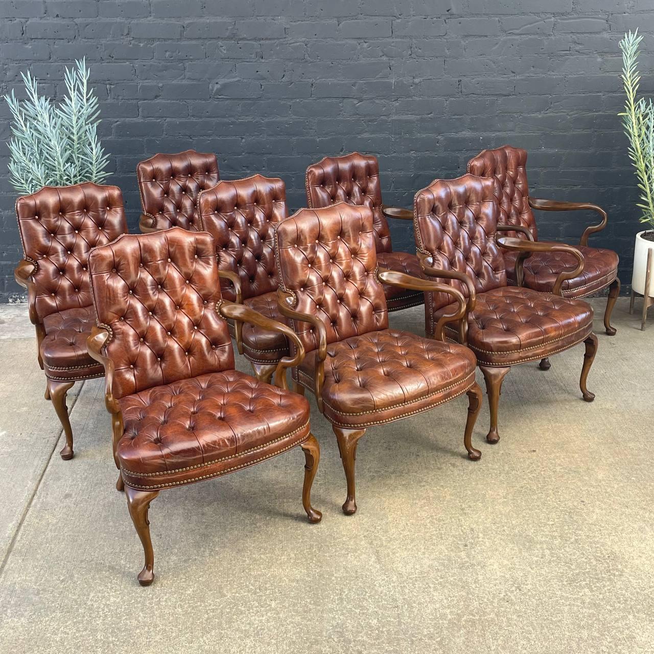 Set of 8 Mid-Century Modern Chesterfield Style Cognac Leather Arm Chairs

Original Vintage Condition

Dimensions: 
38”H x 27”W x 25”D
Seat Height 18.50”