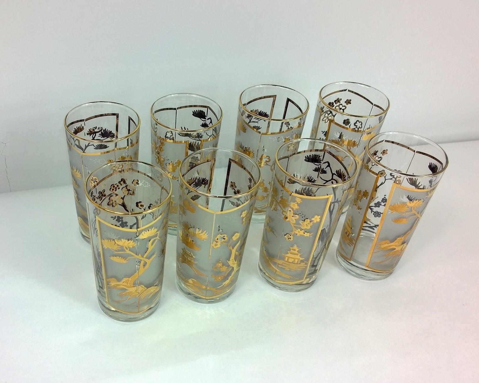 Offered is a set of eight Mid-Century Modern Fred Press style gold gilt on a frosted overlay print pattern Asian / chinoiserie themed (cherry blossom trees and pagodas) clear cocktail glasses. The gilt chinoiserie images on frosted and clear glass