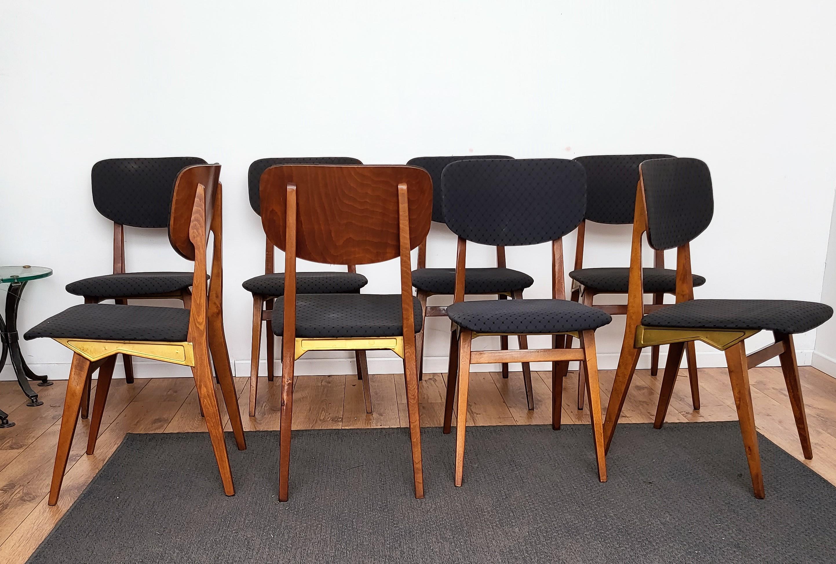 Very elegant Italian Mid-Century Modern set of 8 dining chairs, with greatly shaped wooden structure, upholstered seat and back and beautiful gilt metal detail. , where we find the maker's details, Francor Ospitaletto, a village in the surroundings