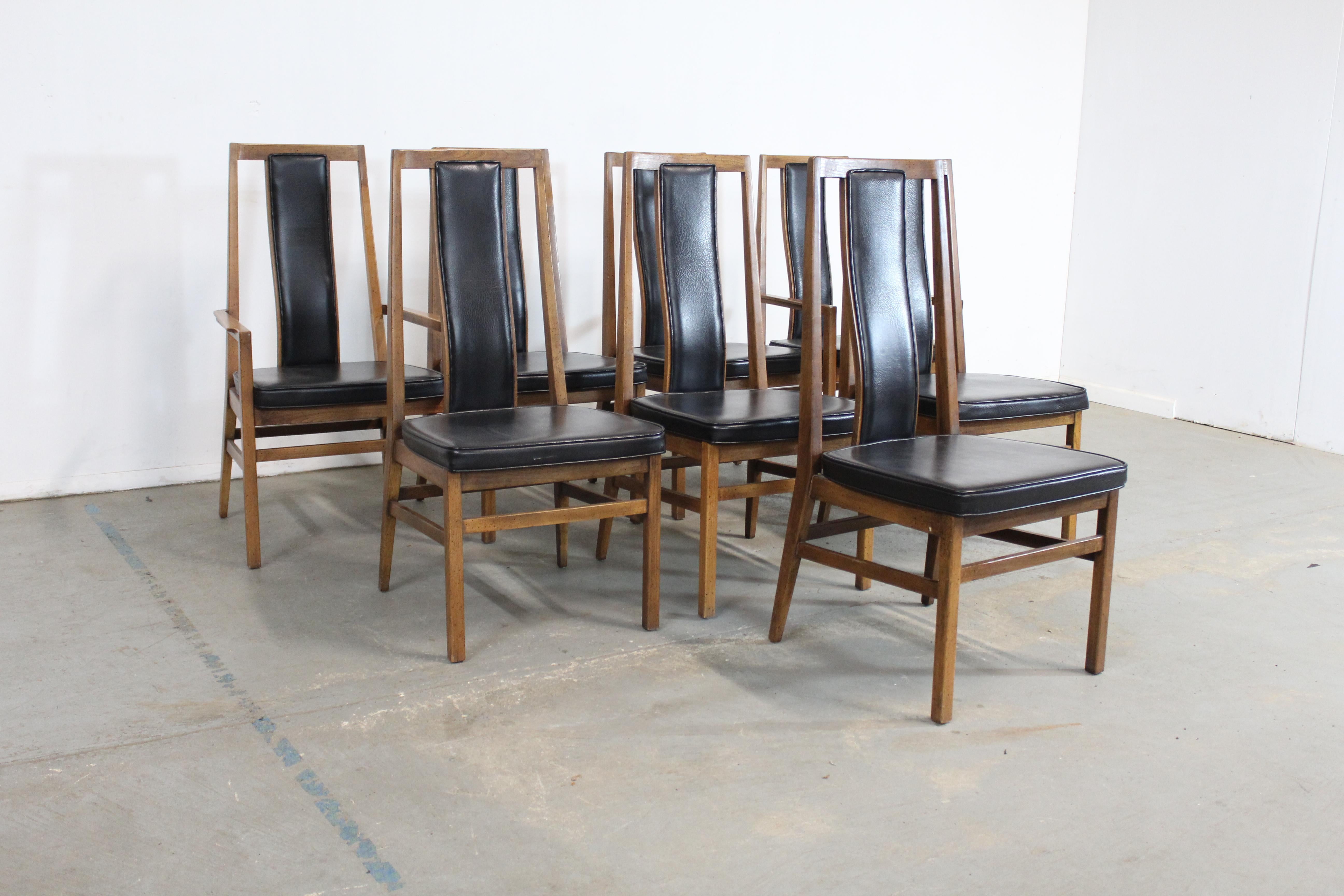 Set of 8 Mid-Century Modern tall back dining chairs by Founders

Offered is a set of set of 8 Mid-Century Modern tall back dining chairs by Founders. Includes 6 side chairs and 2 arm chairs. These chairs have a fantastic look featuring a tall back