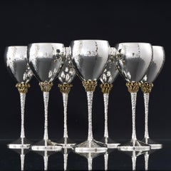 Set of 8 mid-century silver & gilt wine goblets
