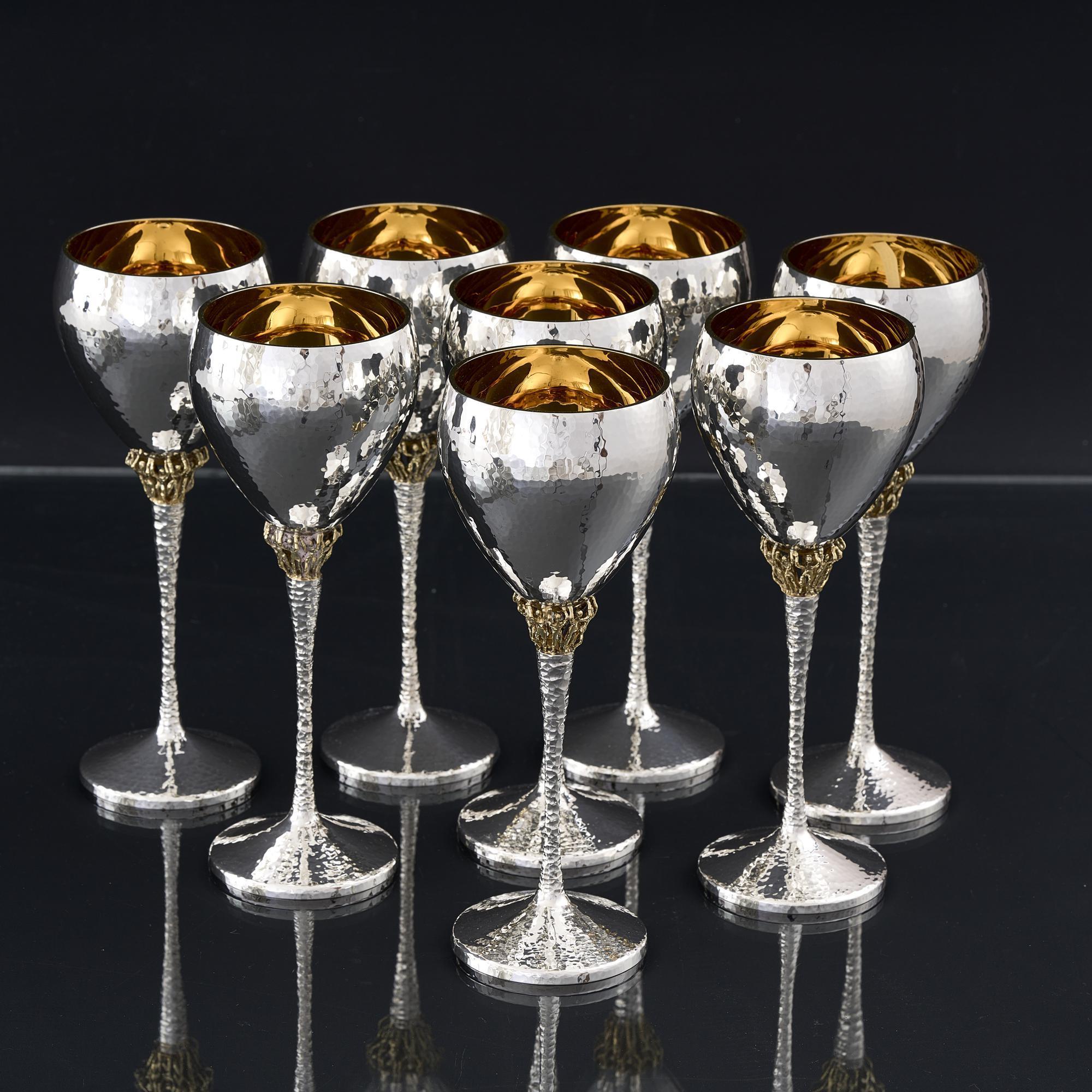 British Set of 8 mid-century silver & gilt wine goblets