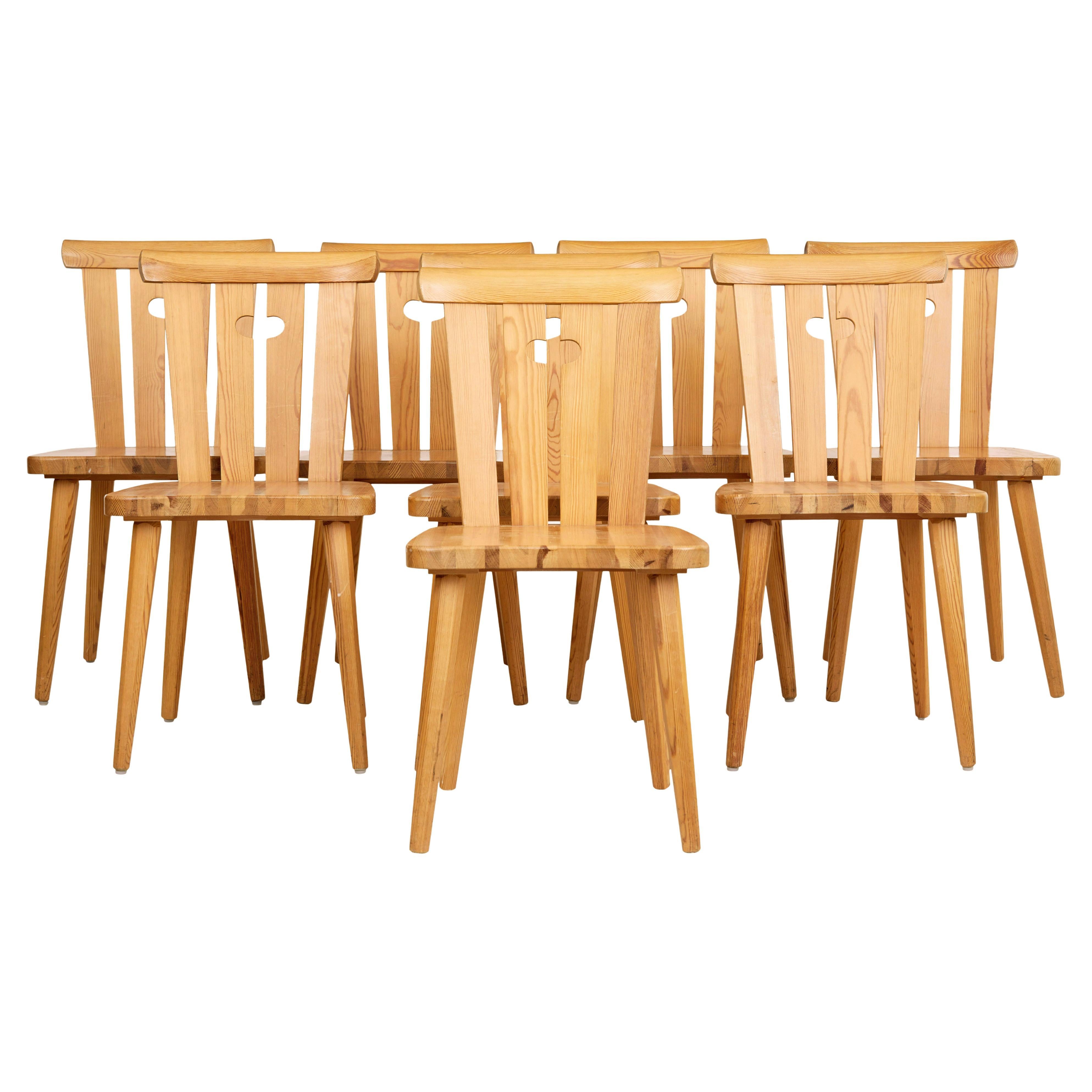 Set of 8 mid century Swedish pine dining chairs For Sale