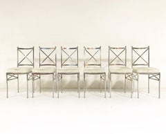 Set of 8 Midcentury Swedish Polished Steel Dining Chairs with Cowhide Cushions