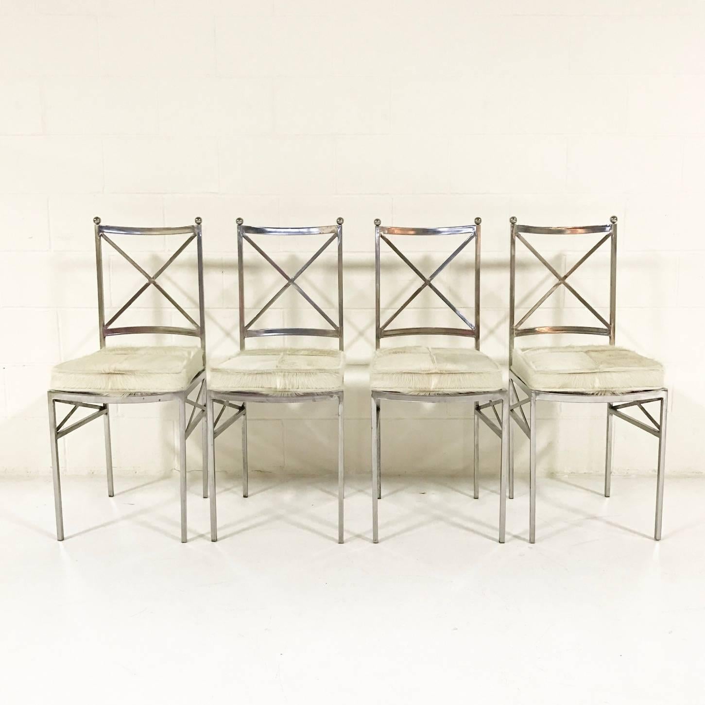 Set of 8 Midcentury Swedish Polished Steel Dining Chairs with Cowhide Cushions In Excellent Condition For Sale In SAINT LOUIS, MO