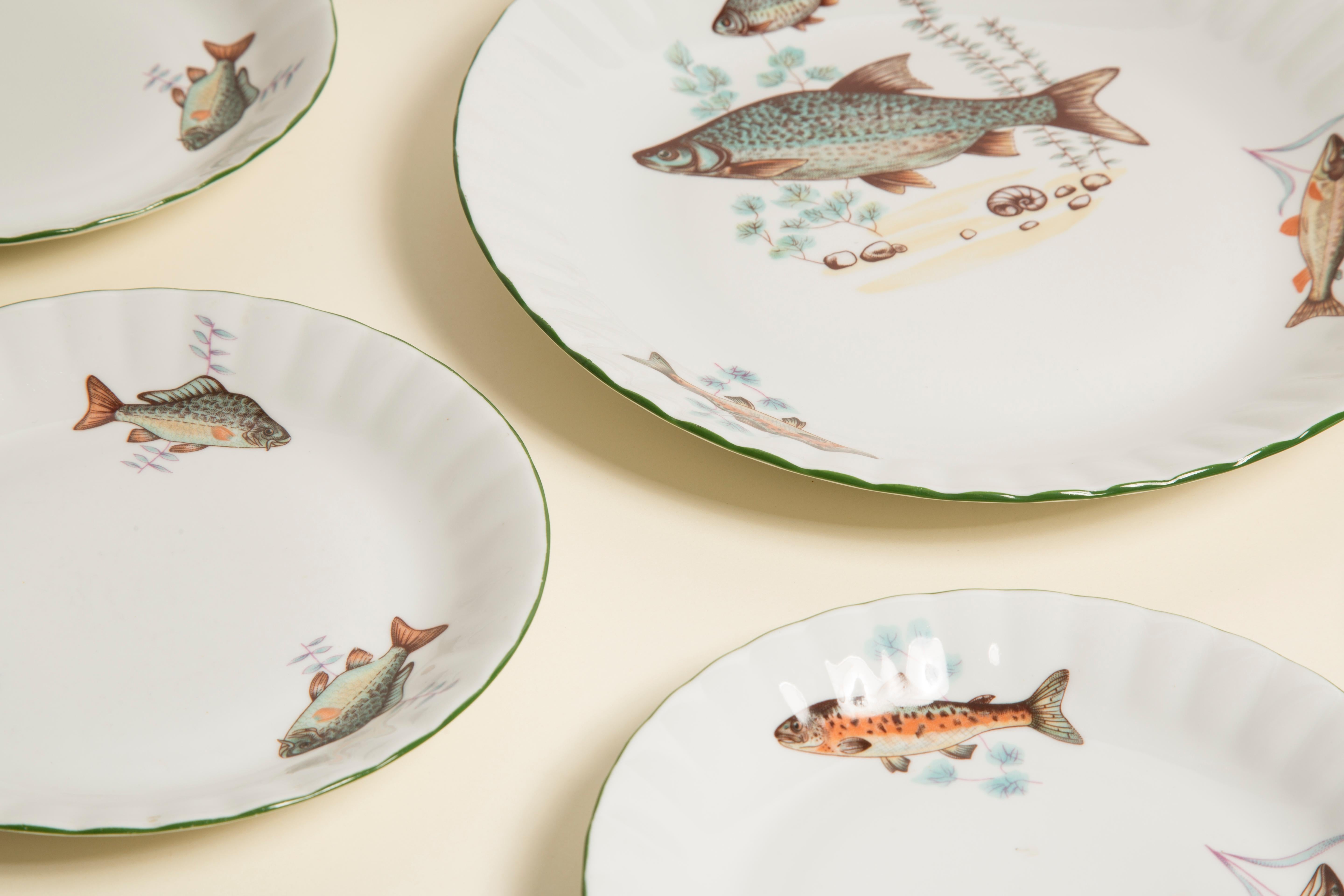 Set of Decorative Fishes plates from Poland. Produced in 1970s.
Every plate is hand painted. Plates are in very good vintage condition, no damage or cracks. Original glass. Beautiful pieces for every interior! Only one unique set.