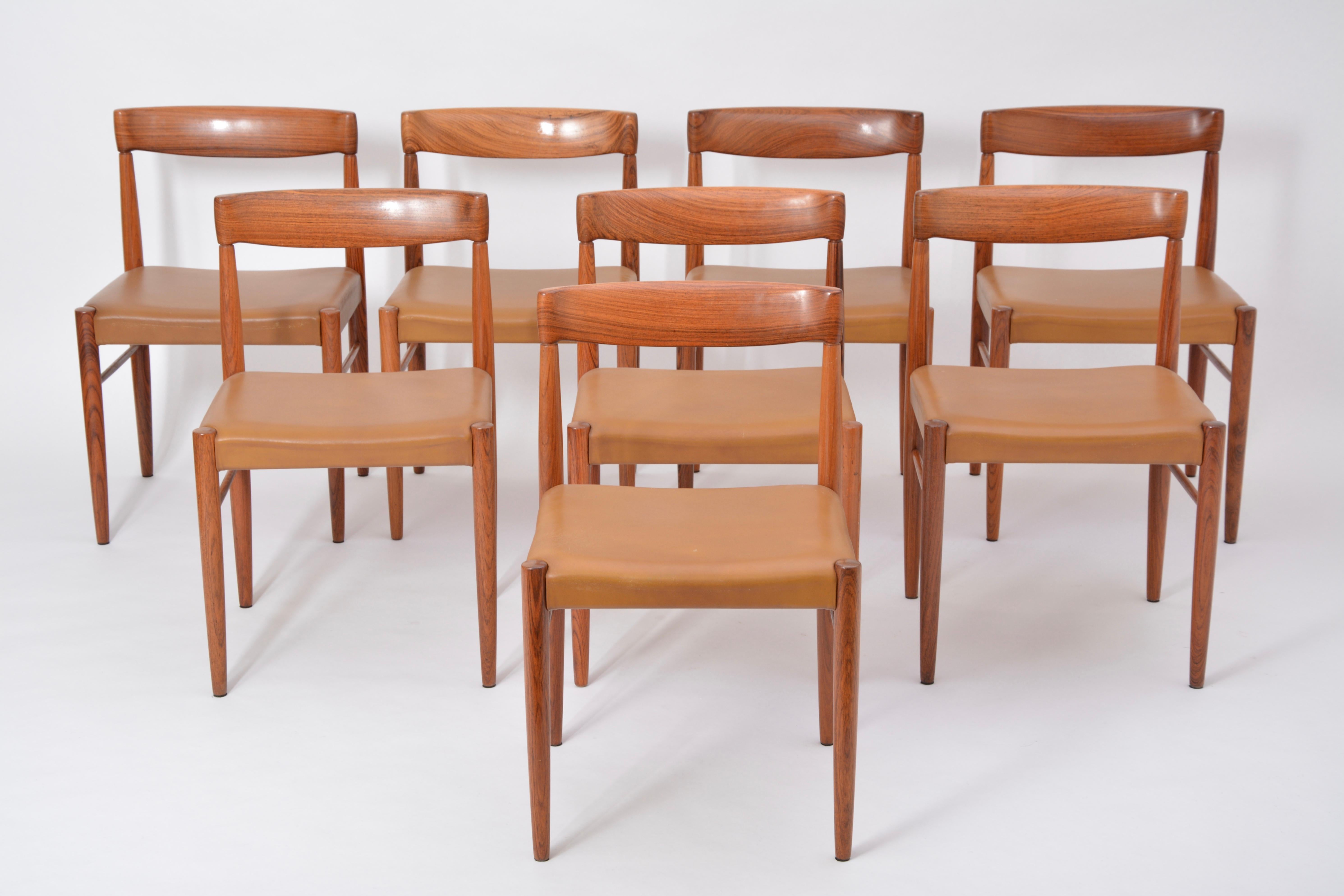 These dining chairs were designed by H. W. Klein and manufactured by Bramin in the 1960s in Denmark. The frames are made of rosewood and the seats are upholstered in light brown leather.