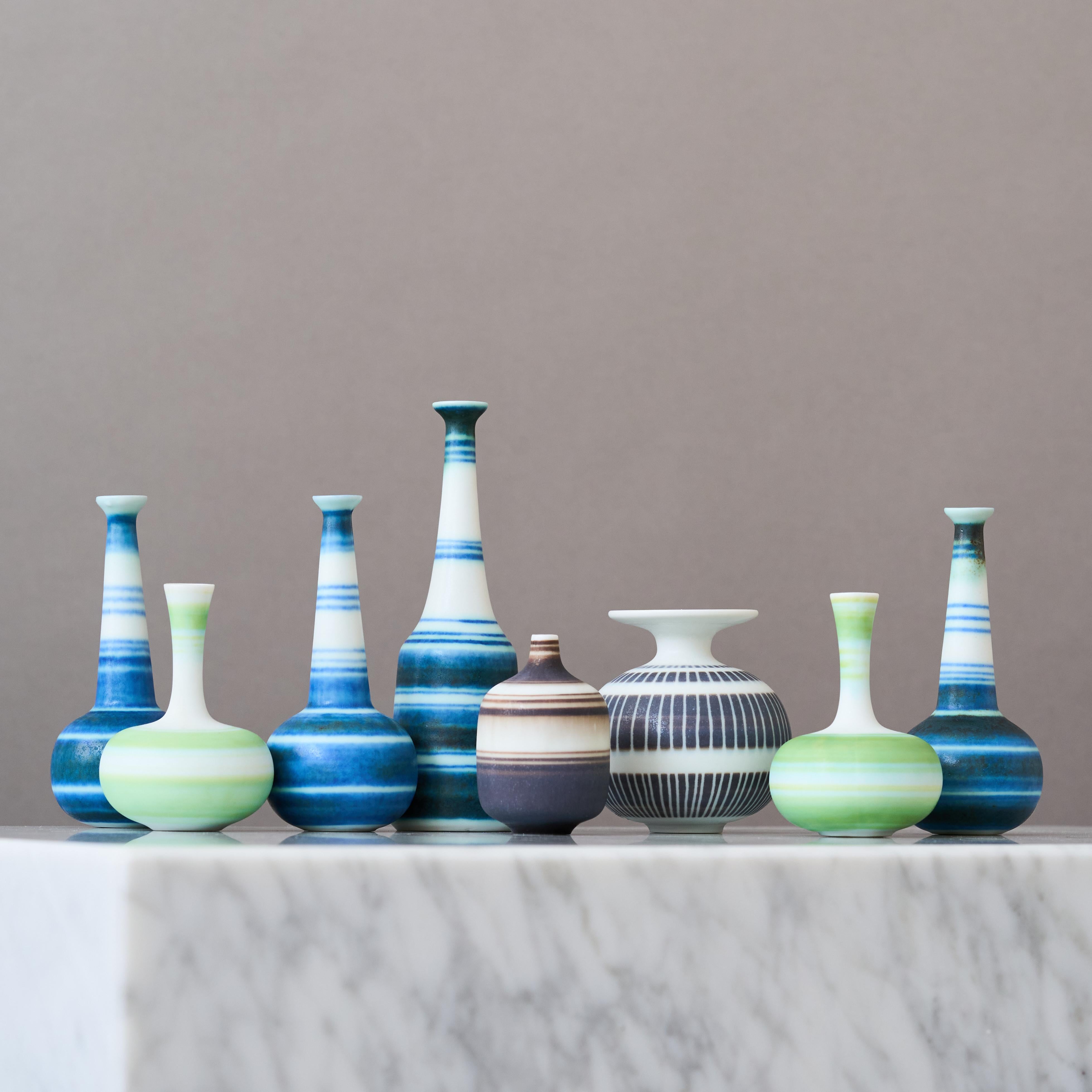Swedish Set of 8 Miniature Stoneware Vases by Gunnar Nylund. Rörstrand, Sweden, 1950s. For Sale