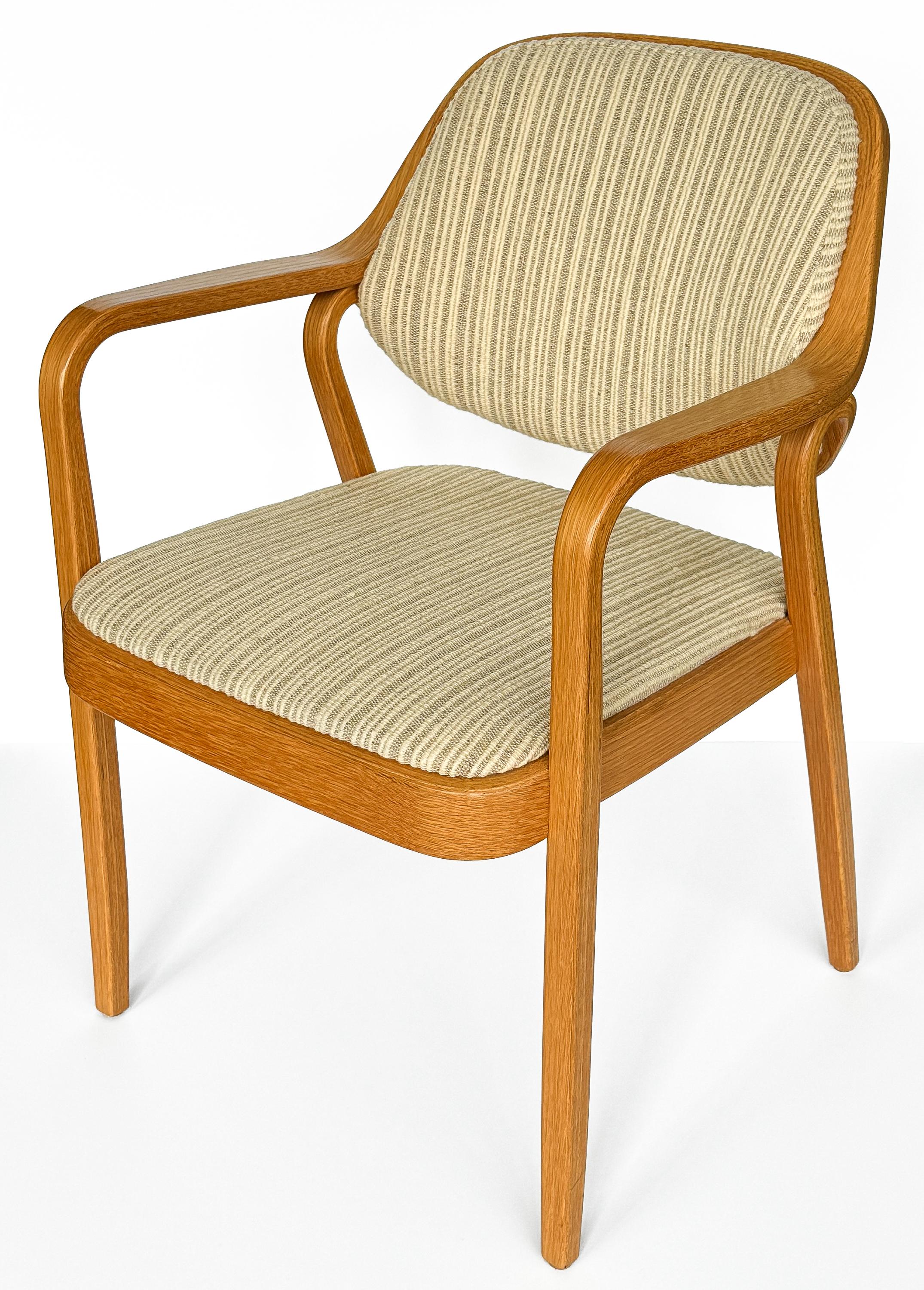 This set of eight bentwood oak dining armchairs by Don Pettit for Knoll, circa 1970s, epitomizes the elegance of mid-century modern design. Model 1105 is a testament to the ingenuity of its era, seamlessly blending form with function in a style that