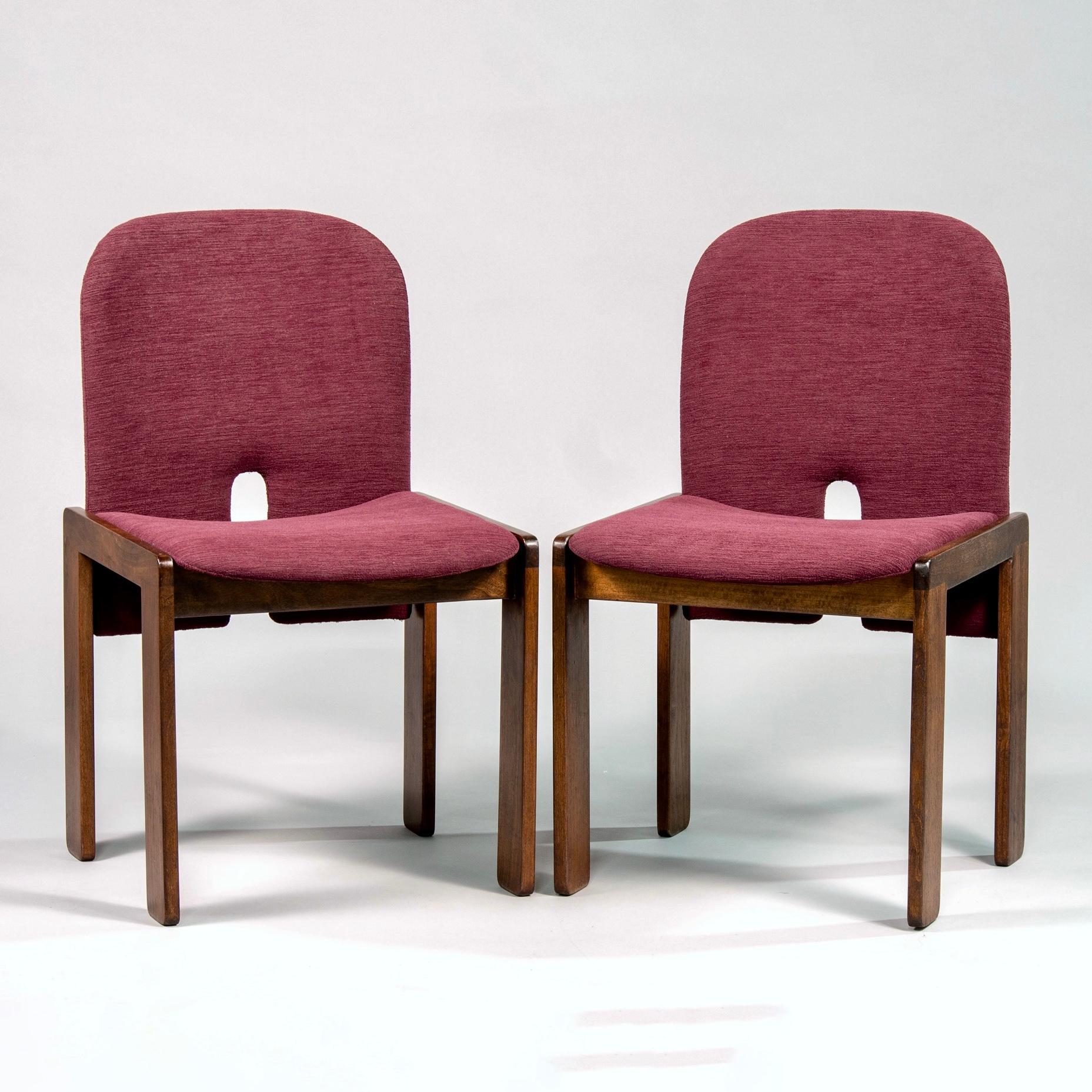 Set of eight Cassina chairs designed by Afra and Tobia Scarpa, circa 1960s. Walnut frames have been professionally refinished and seats and backs are newly upholstered in burgundy colored chenille. Sold and priced as a set of eight.
    