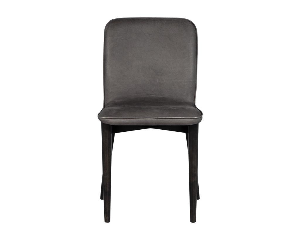 Set of 8 modern leather dining chairs by Carrocel. Custom Brooklyn dining chairs, modern sleek and elegant. Shown in Italian Fuomo Leather and finished in a hand applied espresso finish.
 