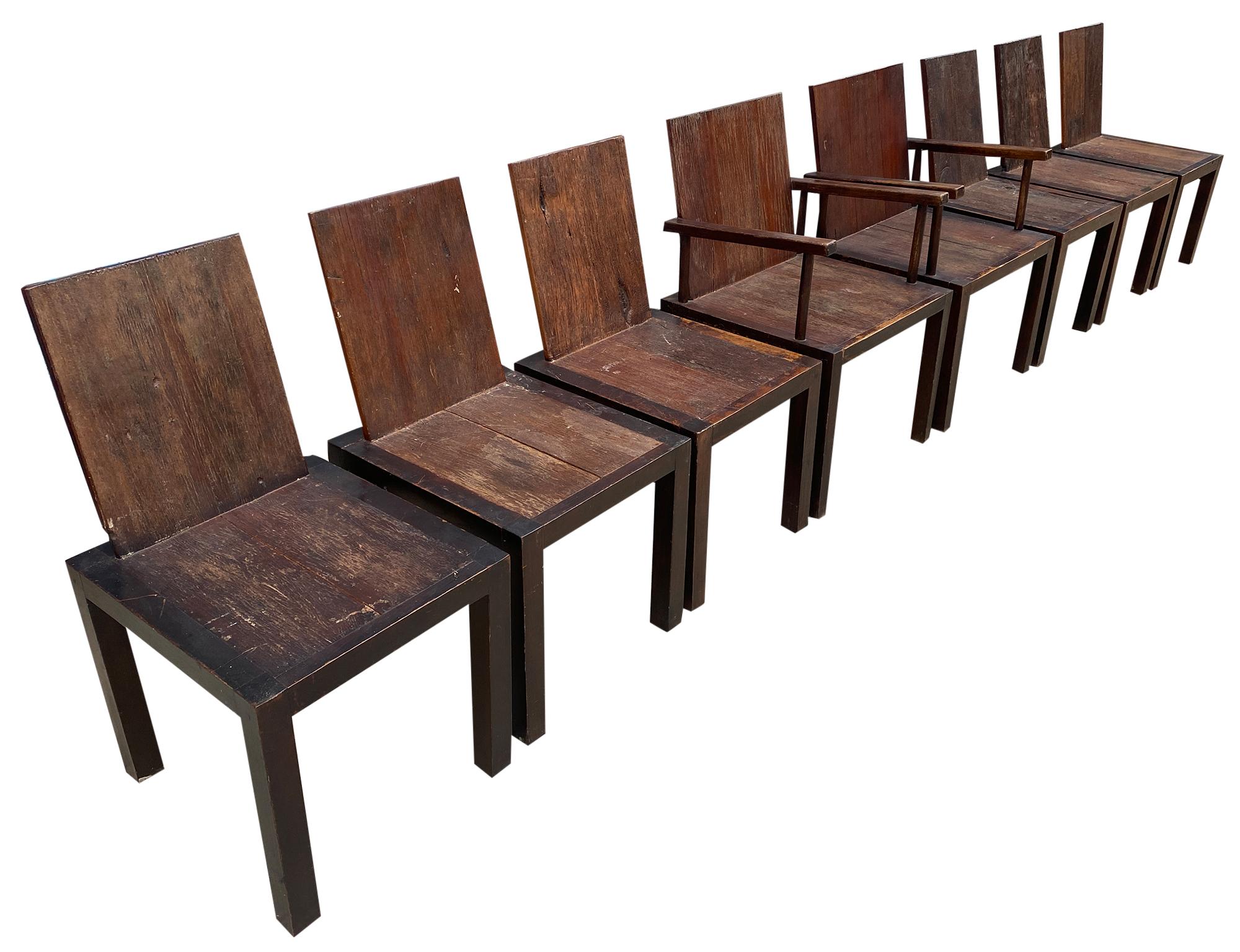Set of 8 Modern rustic organic dining chairs style of Nakashima solid wood with butterfly details. Simple studio craft designed wood chairs in used vintage condition show signs of wear and use. Live wood textured seats with butterfly details on back
