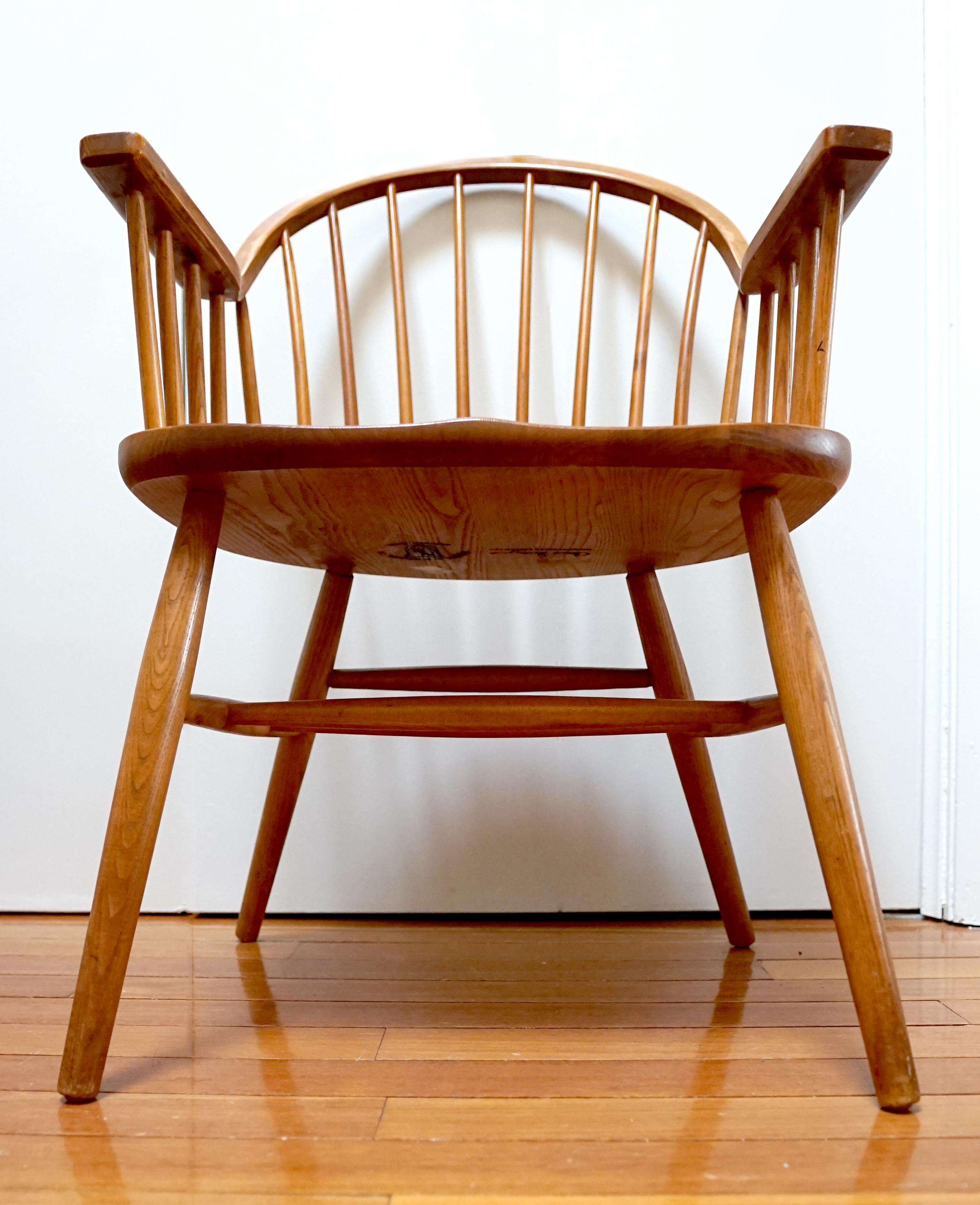 This large set of Nichols and Stone Windsor chairs is large and impressive enough to transform a dining or seating area. The chairs are beautiful and bear the name of the artist who designed them for Nichols and Stone in 1963, Claud Bunyard. 
The
