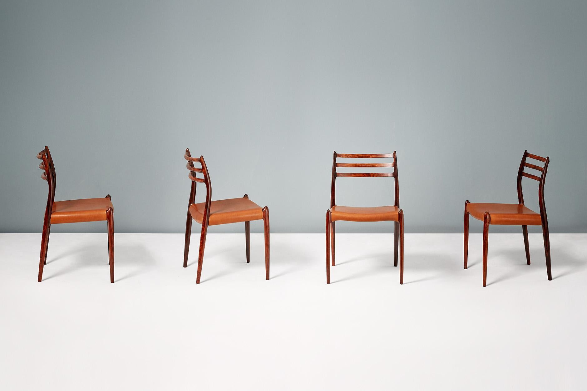Niels O. Møller

Model 78 Dining Chairs, 1962

Set of ten rosewood dining chairs designed by Niels O. Møller for J.L. Moller Mobelfabrik, Denmark, 1962. Seats reupholstered with premium aniline cognac brown leather. 

Larger sets and other