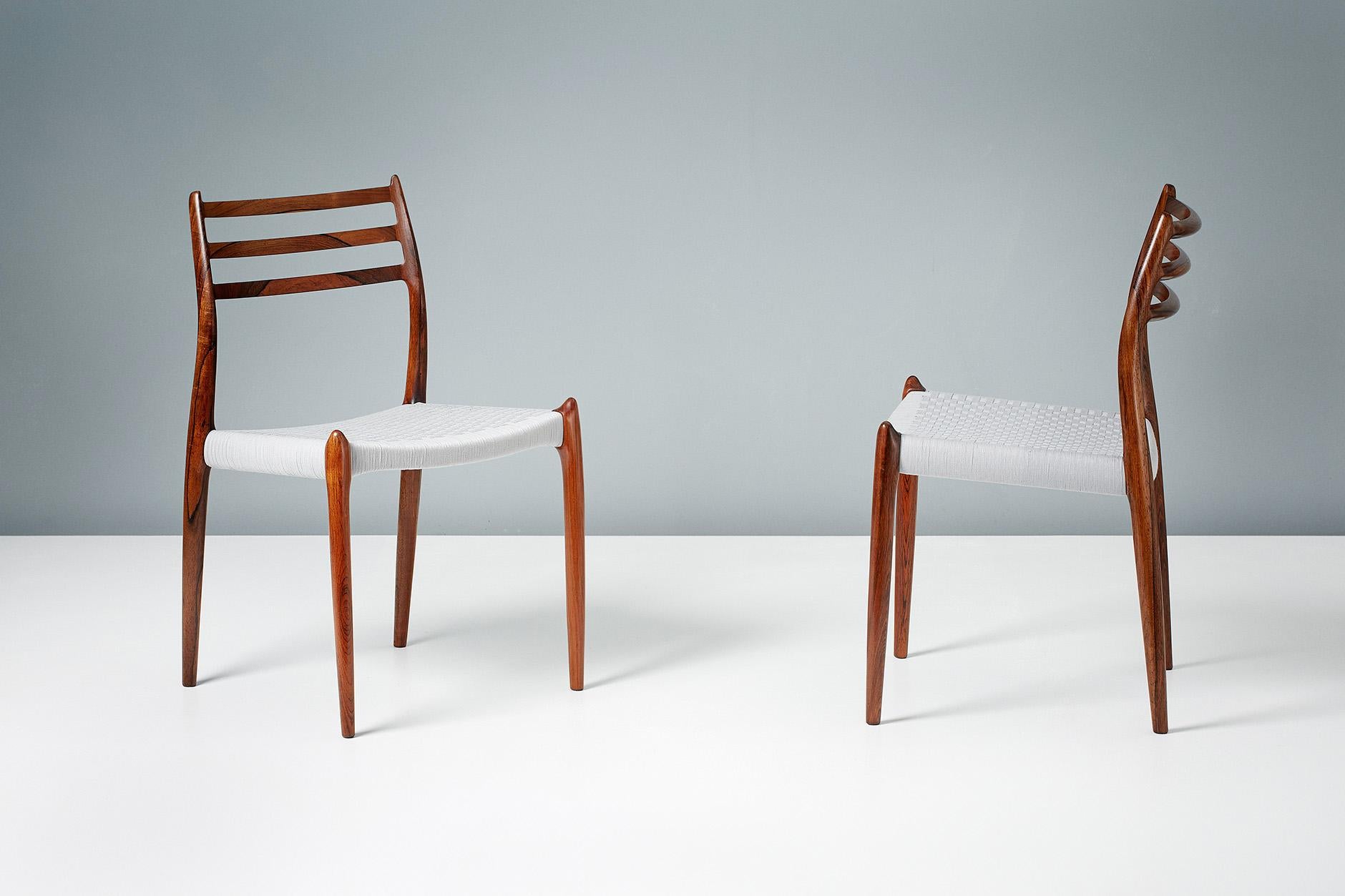 Niels O. Møller

Modell 78 Esszimmerstühle, 1962

Satz von 8 ikonischen Esszimmerstühlen Modell 78, entworfen von Niels O. Møller für J.L. Moller Mobelfabrik, Dänemark, 1962. Die Rahmen sind aus stark gemasertem, exquisitem brasilianischem