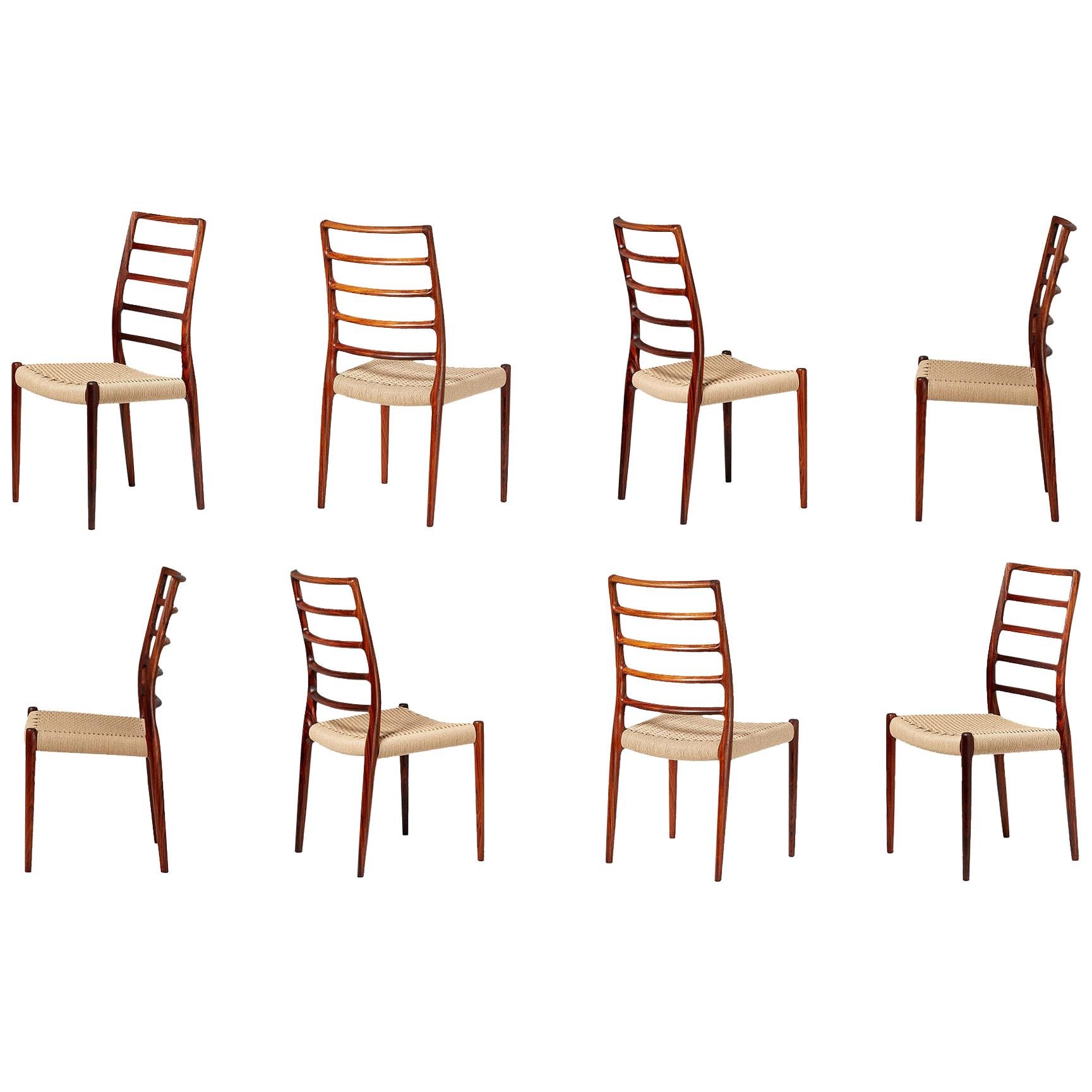 Niels Moller

Model 82 dining chairs, 1970

Set of 8 rosewood dining chairs designed by Niels O. Moller for J.L. Moller Mobelfabrik, Denmark in 1970. Features distinctive curved ladder back and new woven papercord seats. 

Larger sets