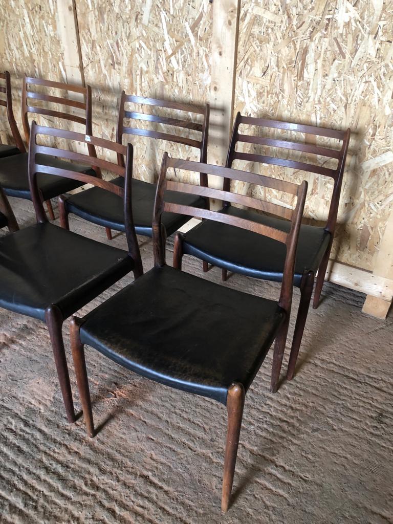 Scandinavian Modern Set of 8 Niels Otto Moller 1962 Dining Chairs with Original Black Leather For Sale