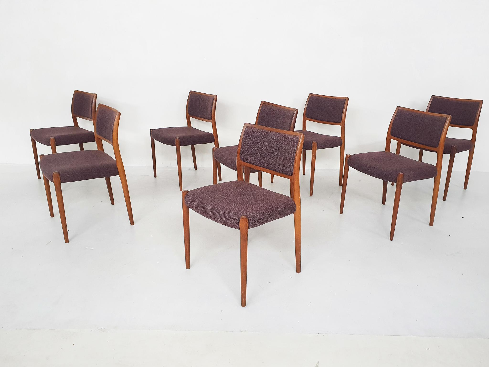 Teak dining chairs with purple upholstery. The former owner had recently reuphosltered the chairs, so the fabric is still in good condition. Only a small stain on one chair. 

Niels Otto Møller was a Danish designer and is one of the most
