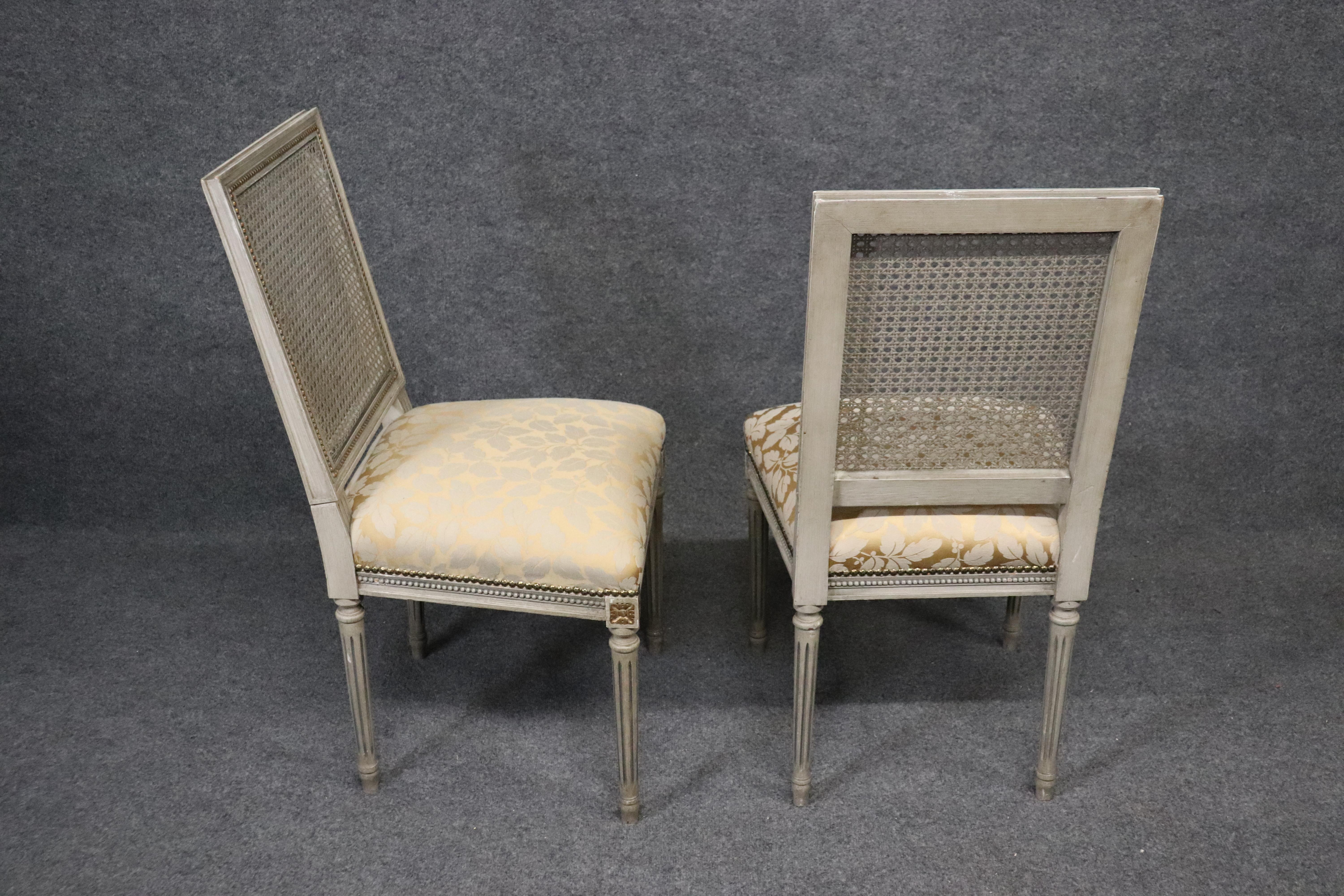 Set of 8 Paint Decorated French Louis XVI Cane Back Dining Chairs, circa 1920s 8