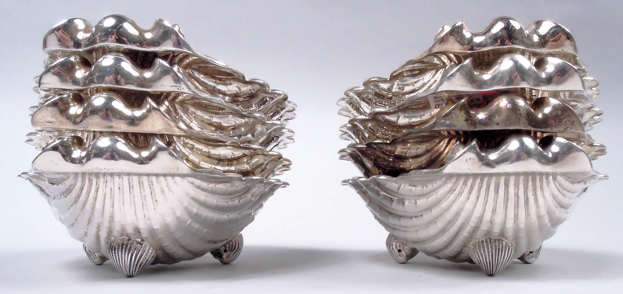 Set of 8 Classical sterling silver scallop shell bowls. Made by Pampaloni in Italy. Each: Interior has fluted and striated gilt flutes. Handle in form of cast volute scrolls. Three cast shell supports. Gorgeous and dynamic. Post-1967 marks. Total