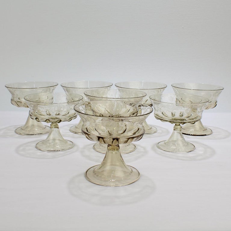 A good group of 8 vintage Venetian glass sherbet bowls or fruit bowls. 

Each with a very delicate hand feel. Perfect for your dessert.

Manufactured by Pauly and Co. in Venice, Italy in a light amber blown glass with a large cup with Renaissance