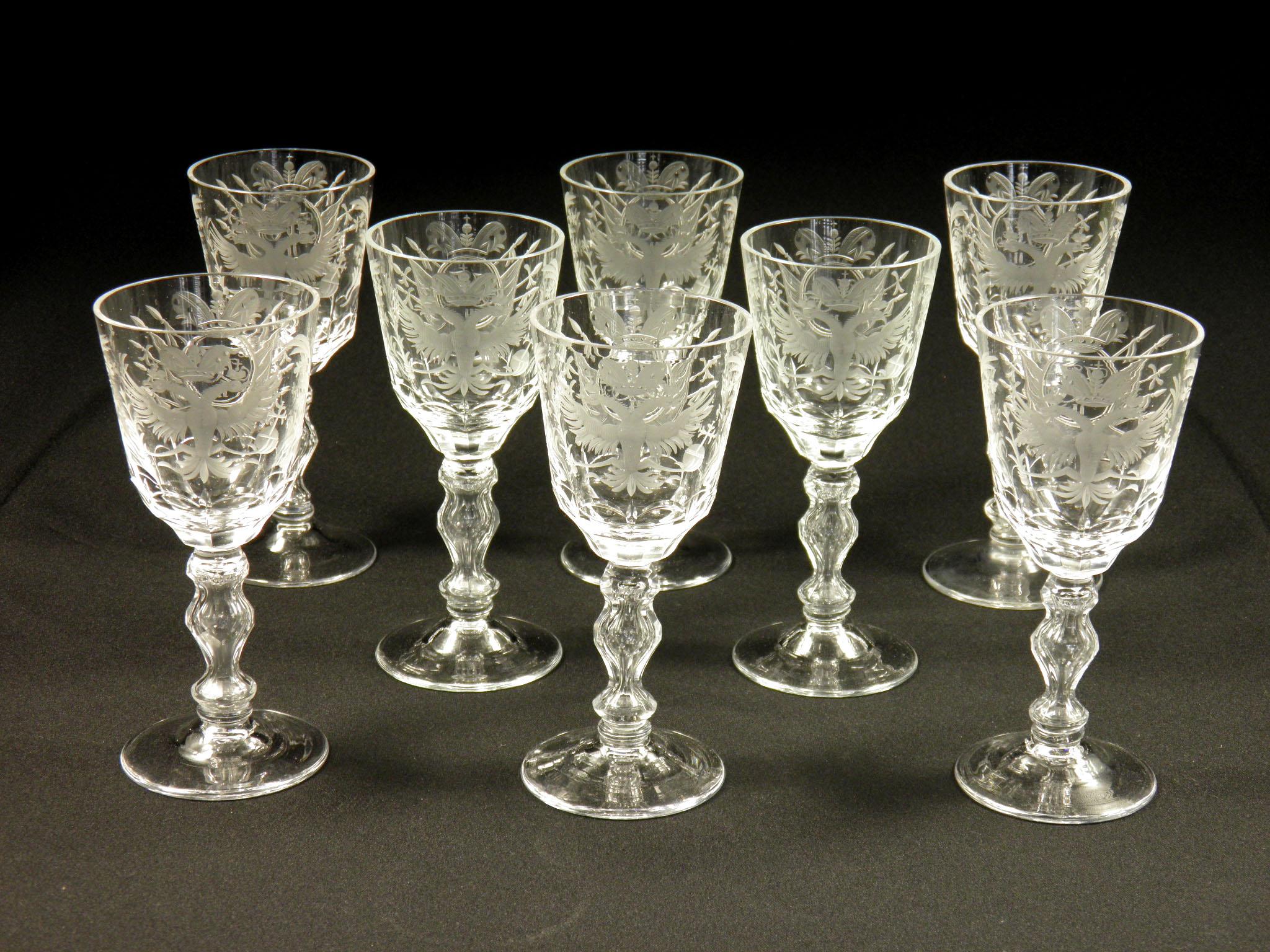 Set of 8+1 wine glasses, hand cut, engraved emblem with monogram, engraved Russian tsarist eagle, probably made in Russia in the 20th century The glasses are in perfect order, without damage – undamaged.
 