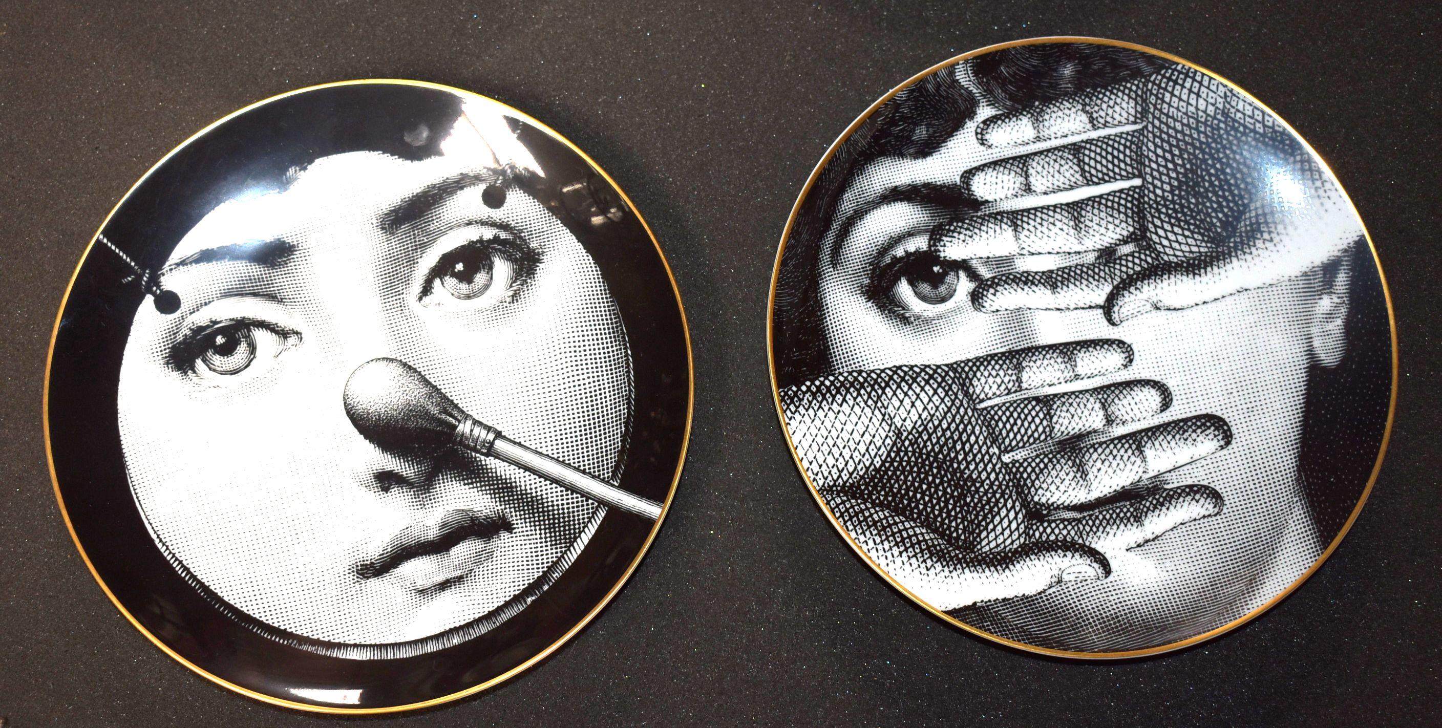 fornasetti plates on wall