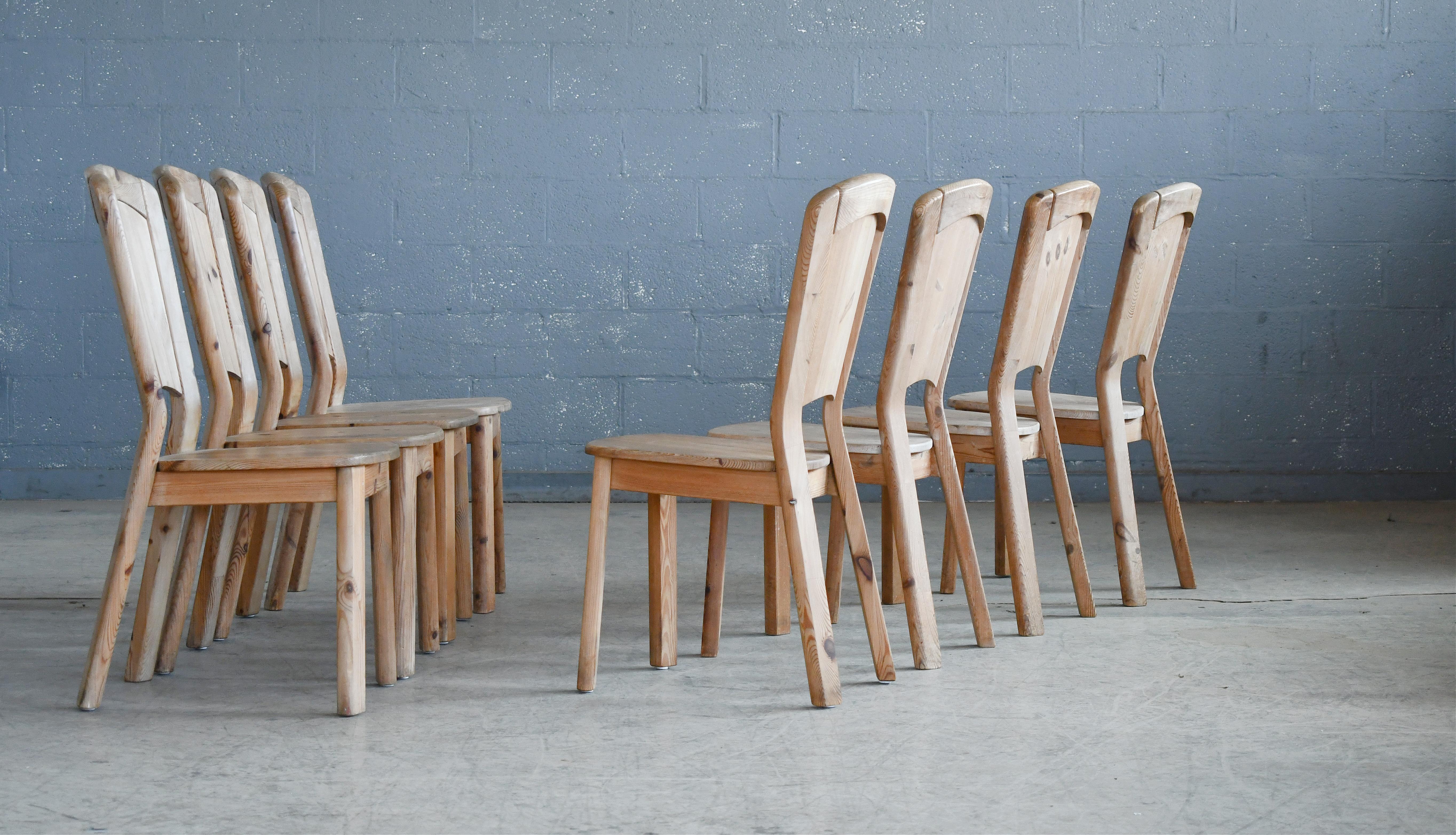 Set of eight superb and very charming pine dining chairs. In the style of Carl Malmsten and even building a little bit on the tradition of the famous 