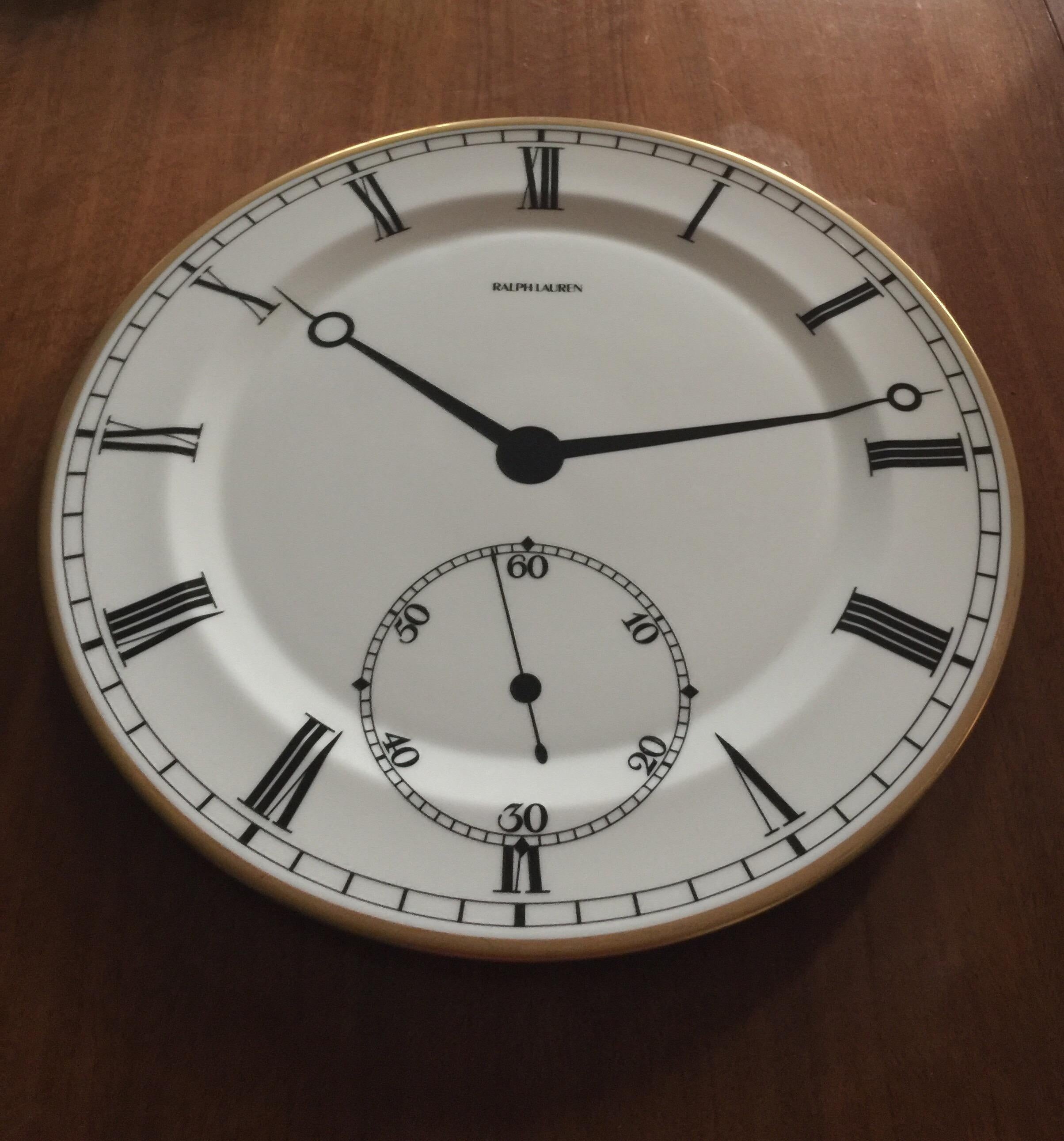 A set of 4 (four) chargers in the Pocketwatch pattern by Wedgwood for Ralph Lauren Home. England, circa 1990. Bone china. 

Dimensions: 12.32 inches wide.



 