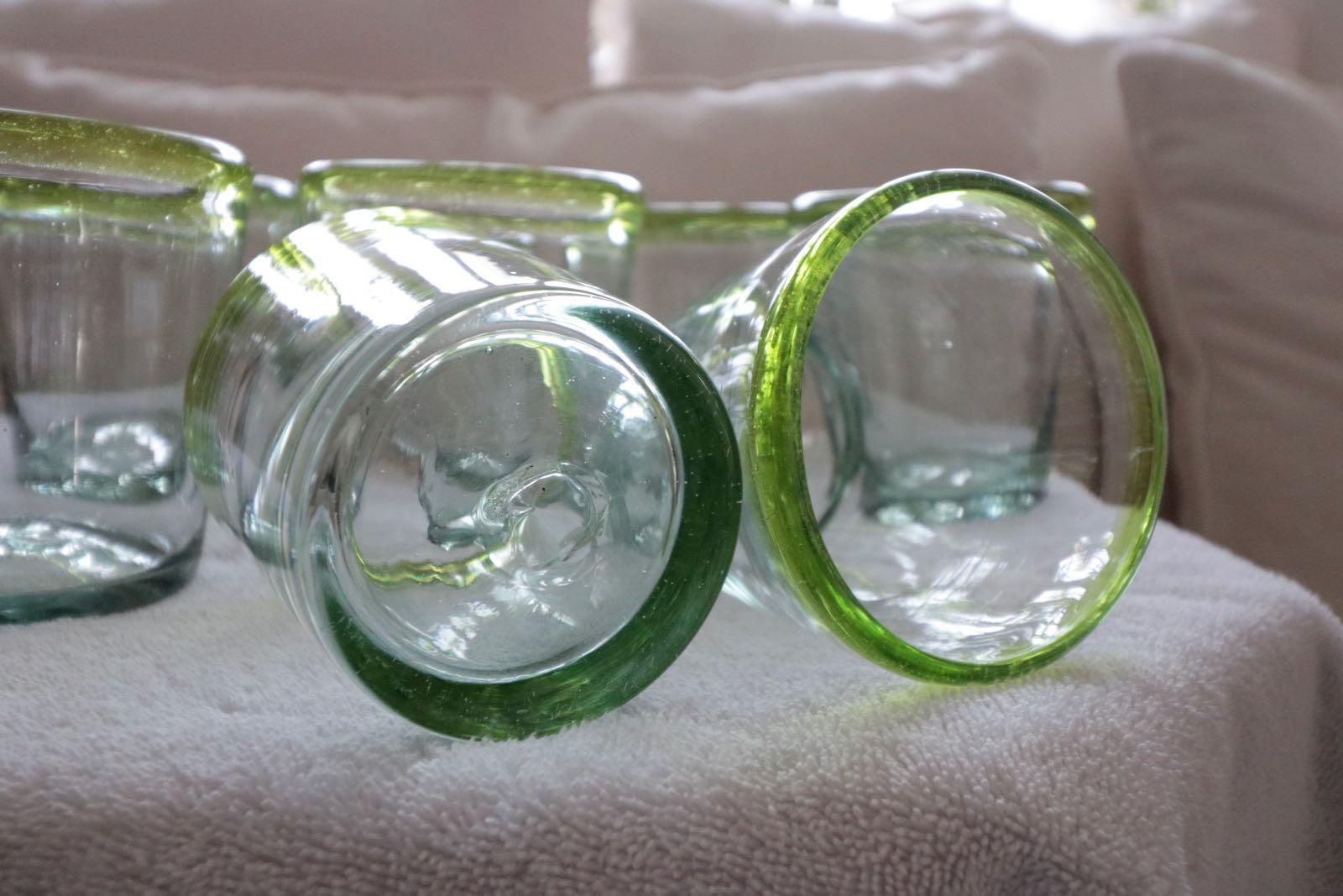 Mid-Century Modern set of 8 sea glass green Murano hand blown glass ware. Beautiful Details in the glass. Fabulous beauty of color a deeper sea glass green surrounds the rims. Great for dinner Parties or any time.