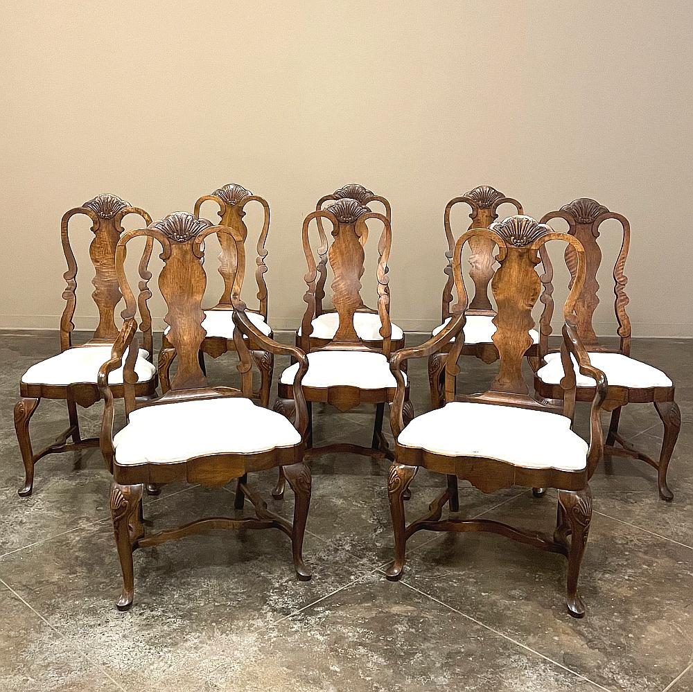 Set of 8 Queen Anne dining chairs includes 2 Armchairs will make a wonderful addition to your dining experience! Generous upholstered seats feature intriguing contours on the front characteristic of the style and provide wonderful dining comfort.