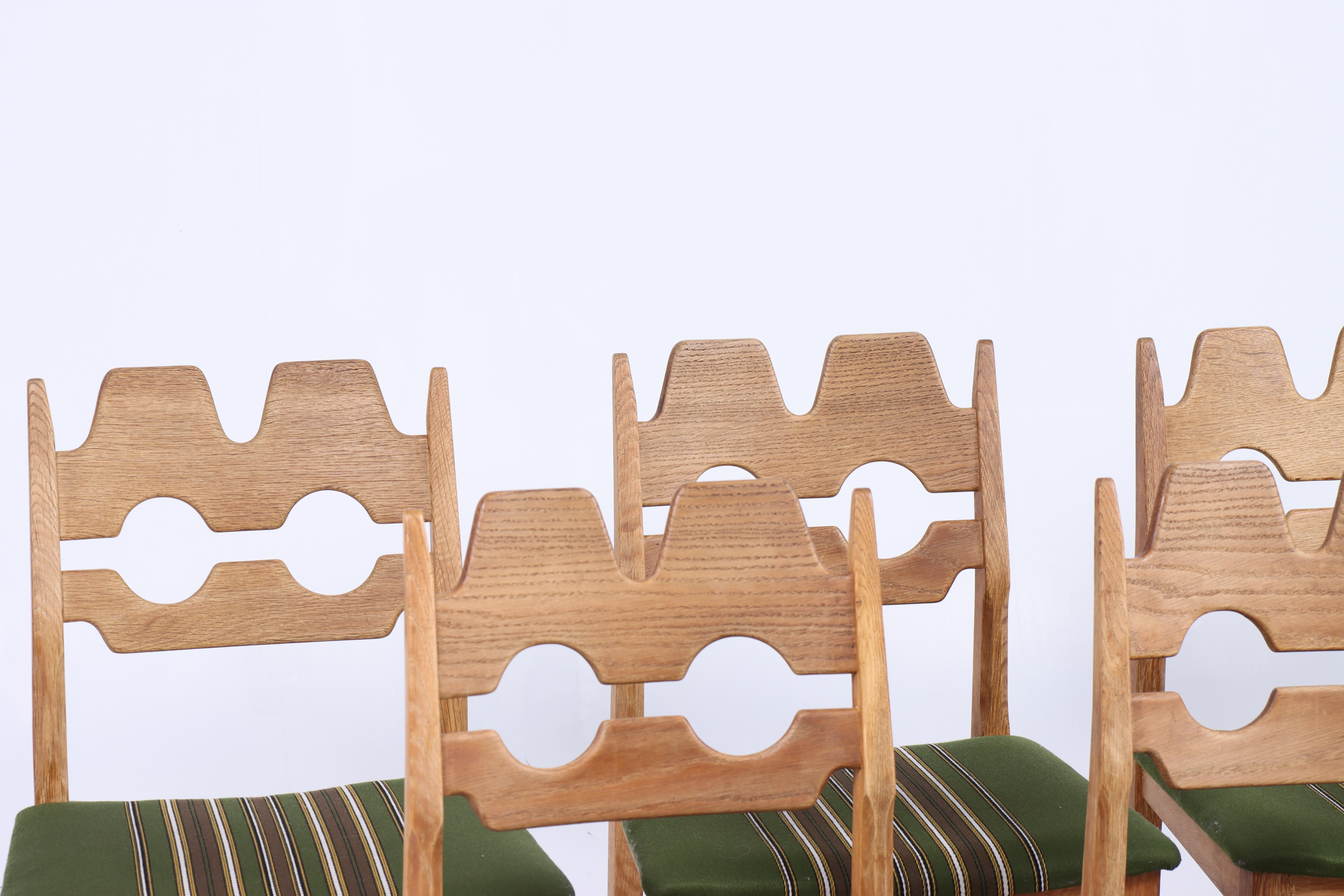 Set of 8 original Razor blade side chairs in patinated oak. Designed by Henning Kjærnulf and made by EG Møbler. Made in Denmark in the 1960s.