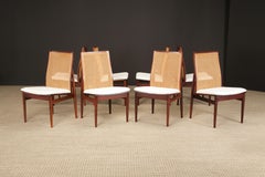 Ensemble de 8 chaises de salle à manger en bois de rose, canne et bouclé par Dyrlund, c 1970, Signé