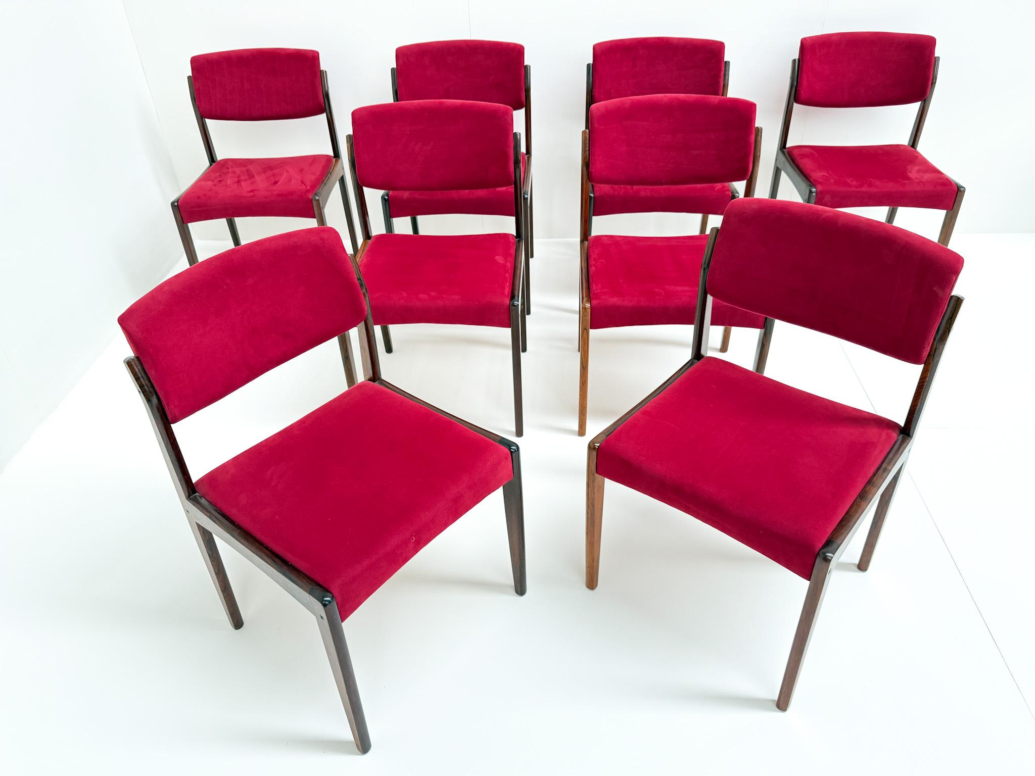 A rare complete set of eight Danish modern dining chairs designed by H.W. Klein for Bramin in the 1960s. Crafted in rich rosewood, these chairs exemplify the clean lines and exceptional craftsmanship of Scandinavian design. The frames feature