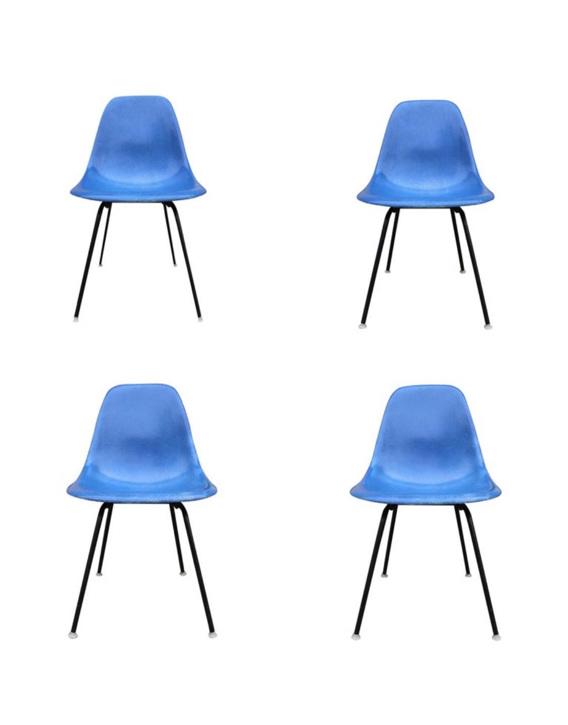 Set of 8 Herman Miller Eames fiberglass dining chairs. Authentic vintage tops and bases. In good vintage condition with normal wear. All new shock mounts installed at $1000 value. Bases available in metallic or black (as shown in photos). All chairs