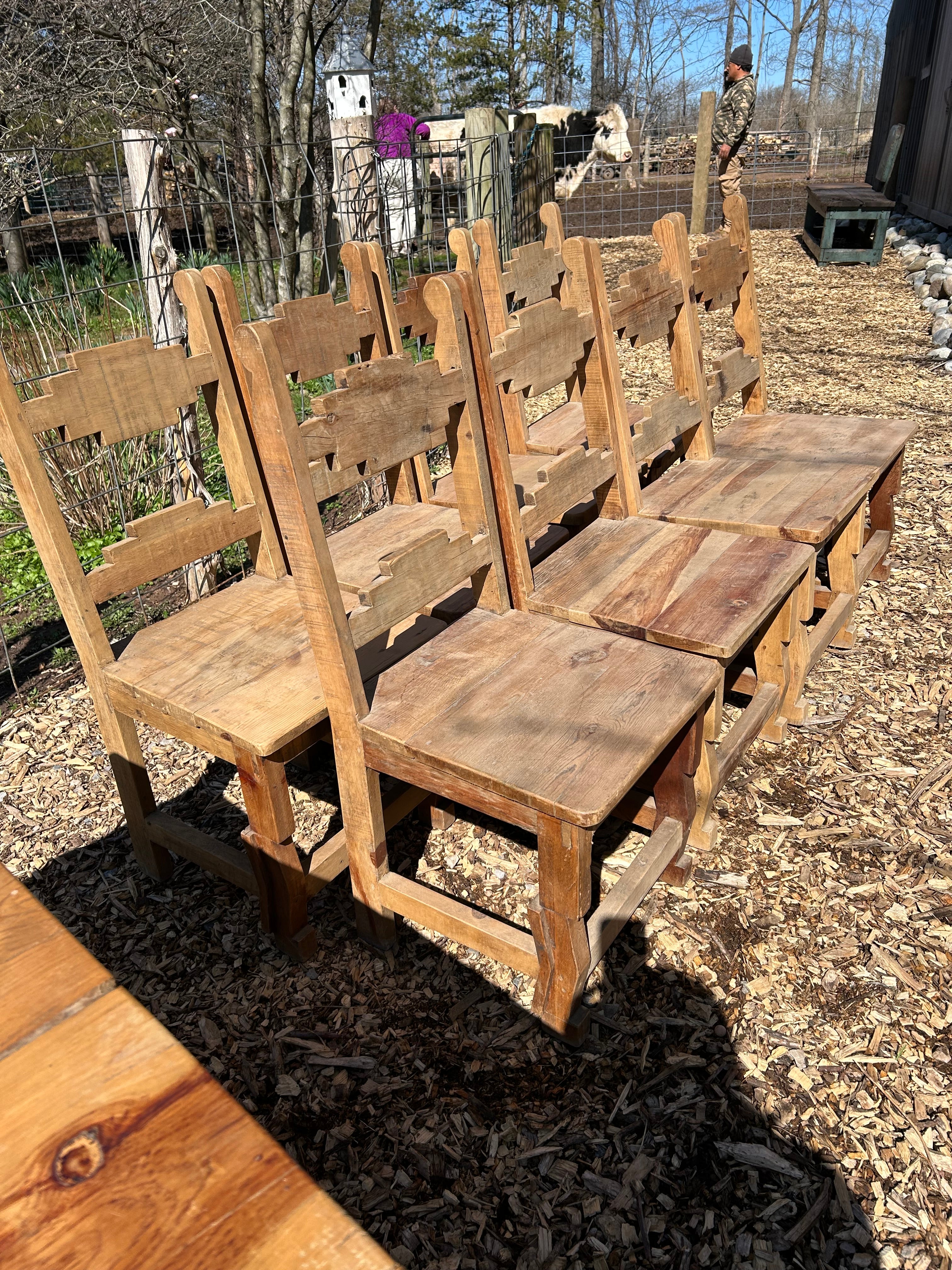 Set of 8 rustic pine hand made dining chairs from Mexico having natural color.

Note: Matching farm table is listed.