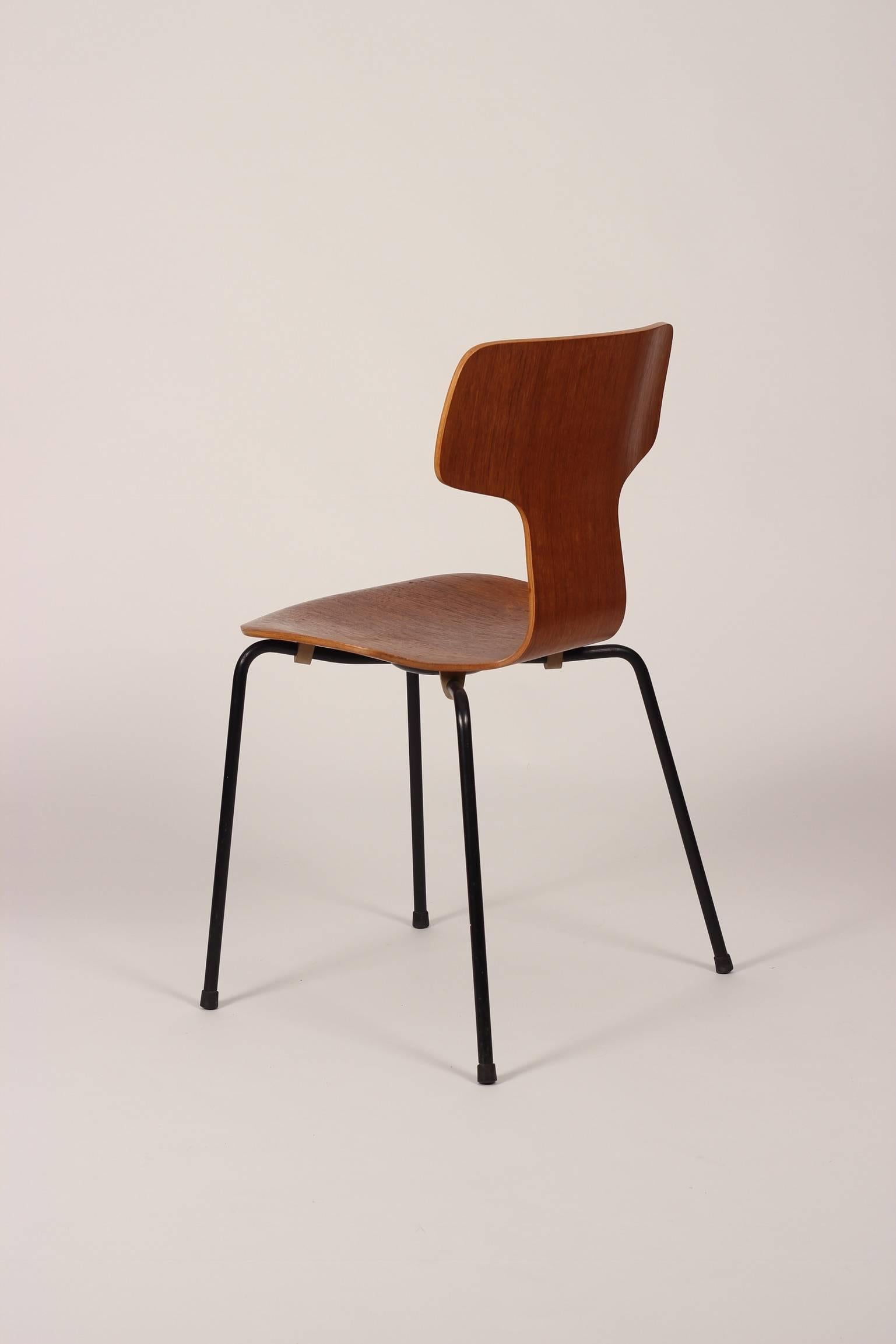 A set of eight teak T-Chairs model 3103 designed by Arne Jacobsen in 1957 for Fritz Hansen. These Danish Mid-Century Modern dining chairs, original early editions in excellent vintage condition. Like its predecessors the Ant chair and series 7