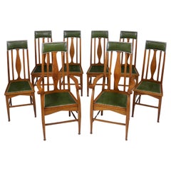 Ensemble de 8 chaises de salle à manger écossaises Arts & Crafts en chêne doré attribué E.A. Taylor