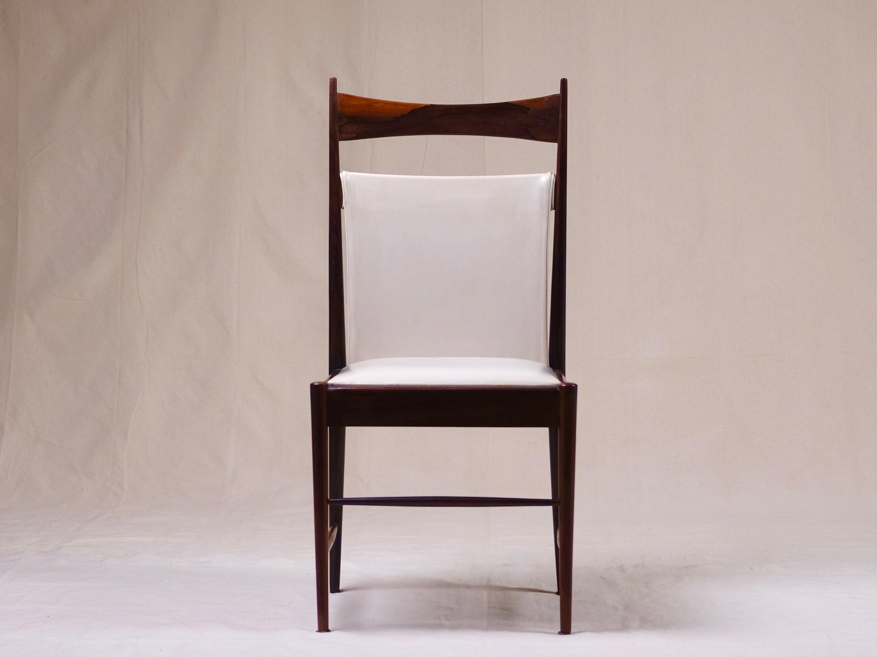 A set of 8 original & wonderfully elegant High-back ‘Cantu’ chairs by Sergio Rodrigues, for OCA in 1959 Brazil.

These are the rare originals & not the recent reissues.

This set comes with the two larger seated chairs to go at each end of the