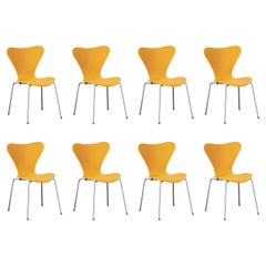 8 Stühle der Serie 7, gebranntes Gelb und Stahlchrom von Arne Jacobsen