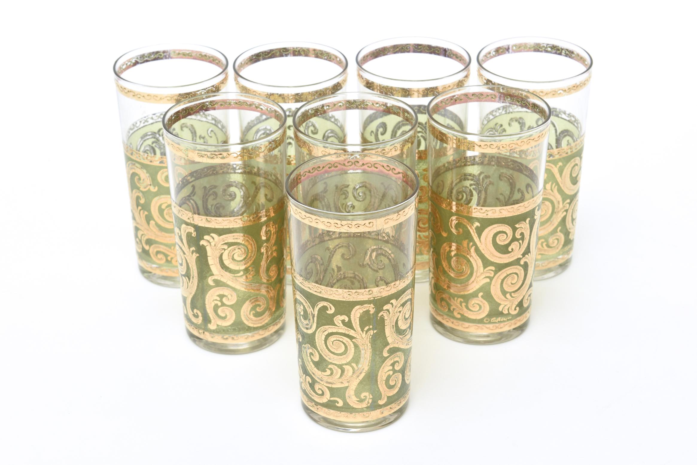 This set of 8 signed culver Mid-Century Modern glass barware are the highball glasses with a 22-carat gold painted overlap with scroll pattern against apple green or chartreuse glass. The rim of gold is also scroll work in gold. They are from the
