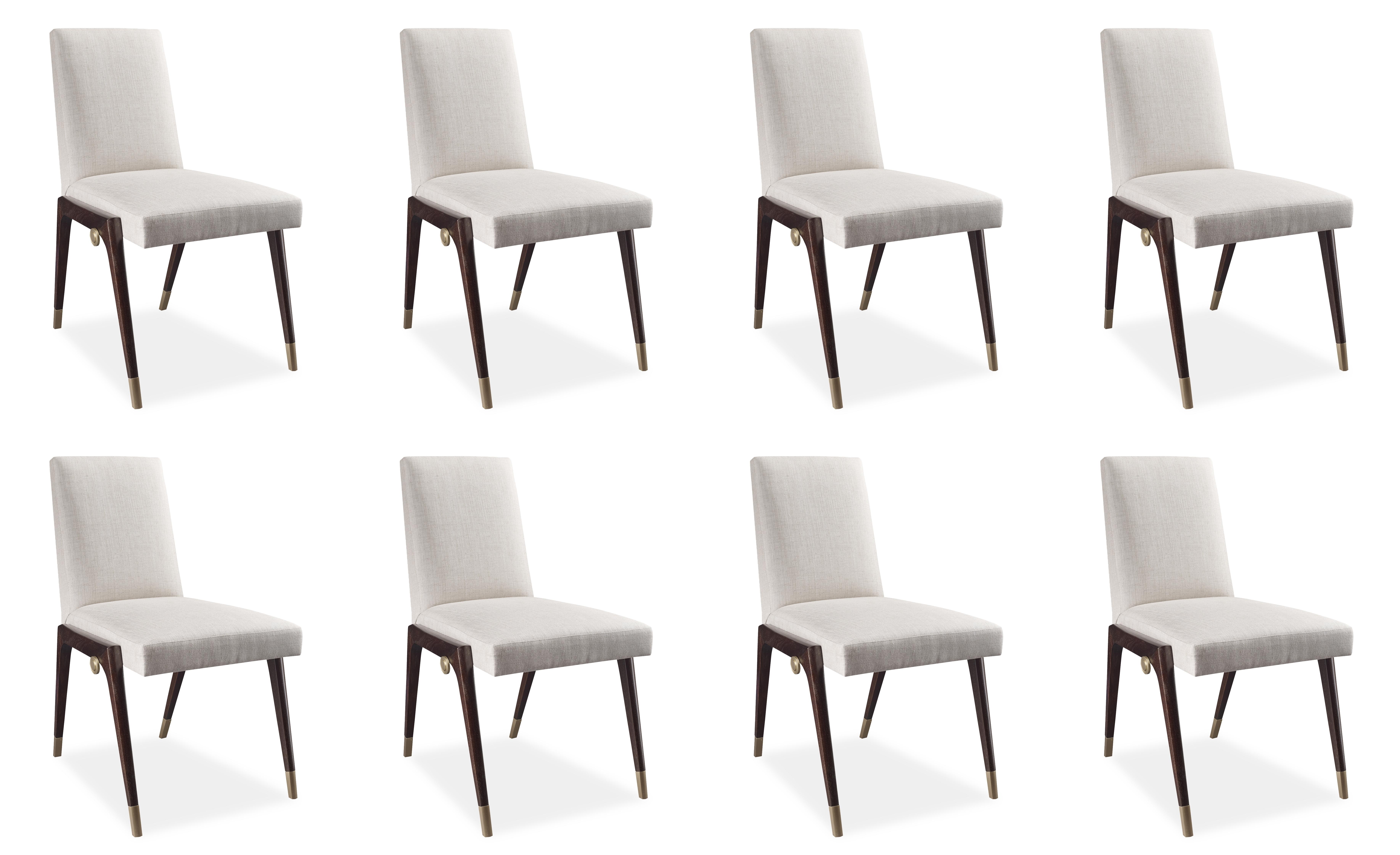 Like a sling, the mahogany base supports the finely tailored, crisp upholstery held together with artful brass dowels. The epitome of comfort and design, this chair will make heads turn.

The chairs are about 1 year old and barely