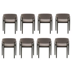 Set Of 8 Slope Dining Chairs Featuring an Ergonomic Backrest