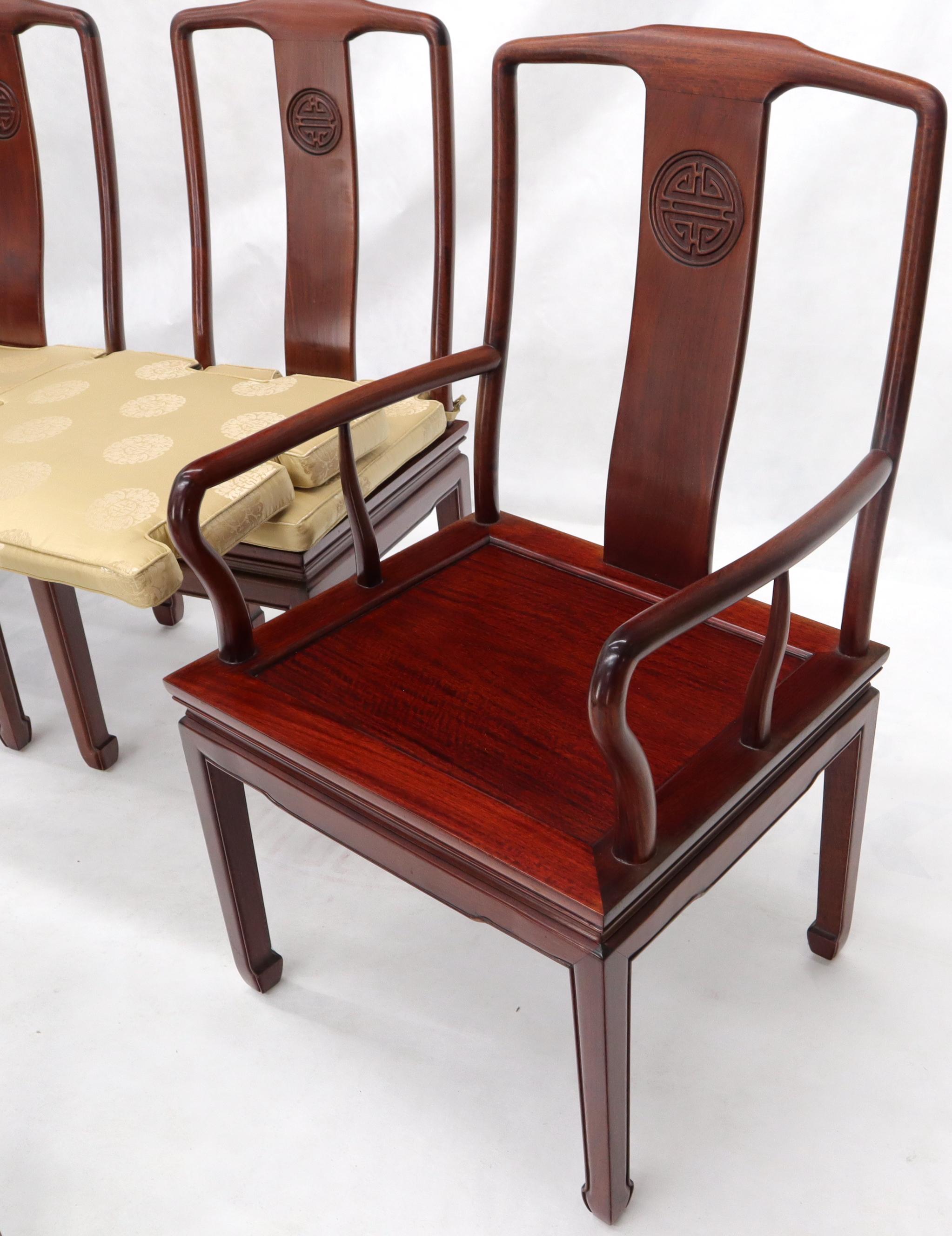 Set of 8 Asian Mid-Century Modern decor fit dining chairs in solid rosewood. Rock-hard study and solid chairs in excellent condition.
