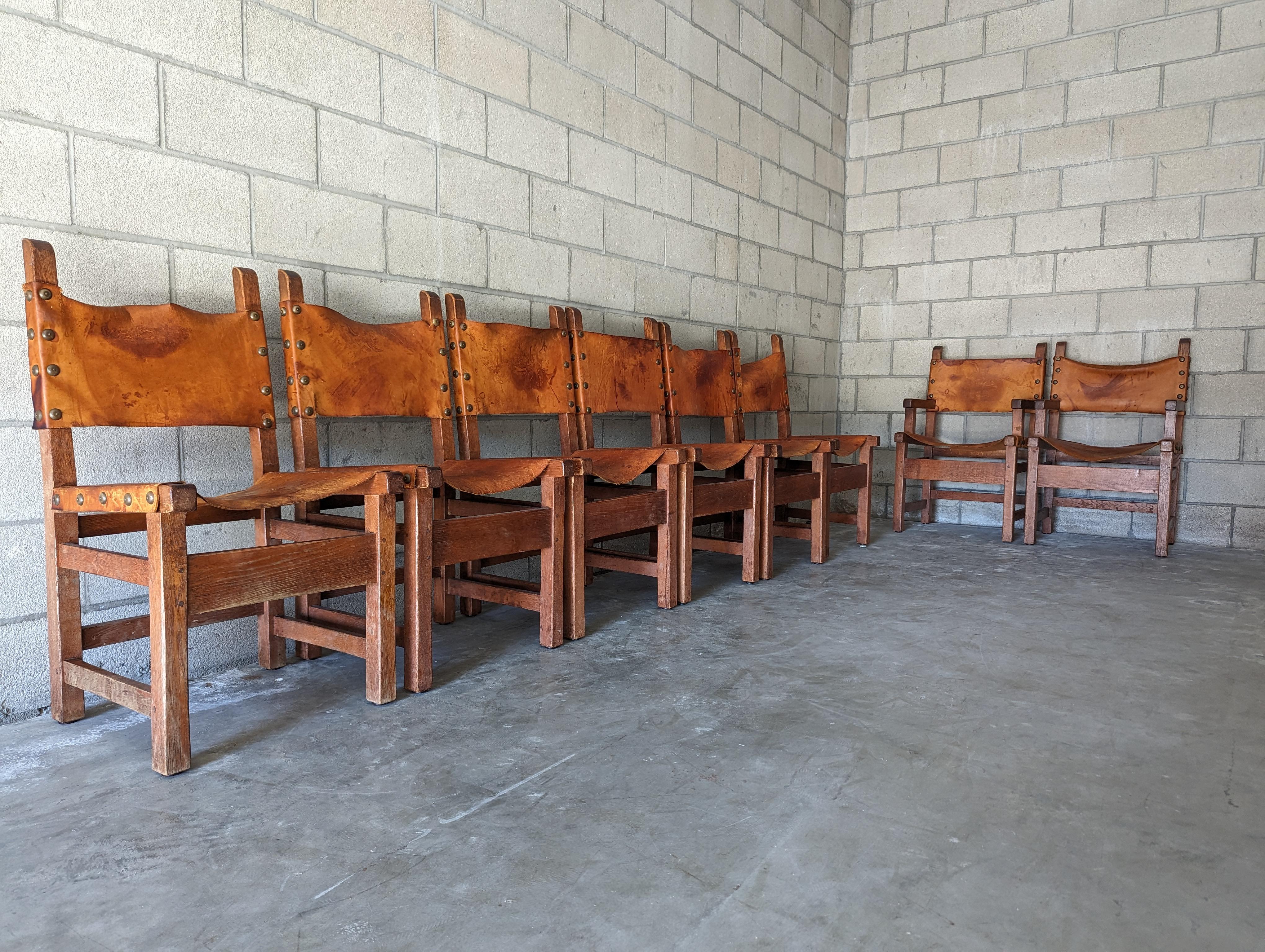 Set of 8 Spanish Hand-Crafted Oak & Cognac Studded Leather Dining Chairs In Good Condition In Chino Hills, CA