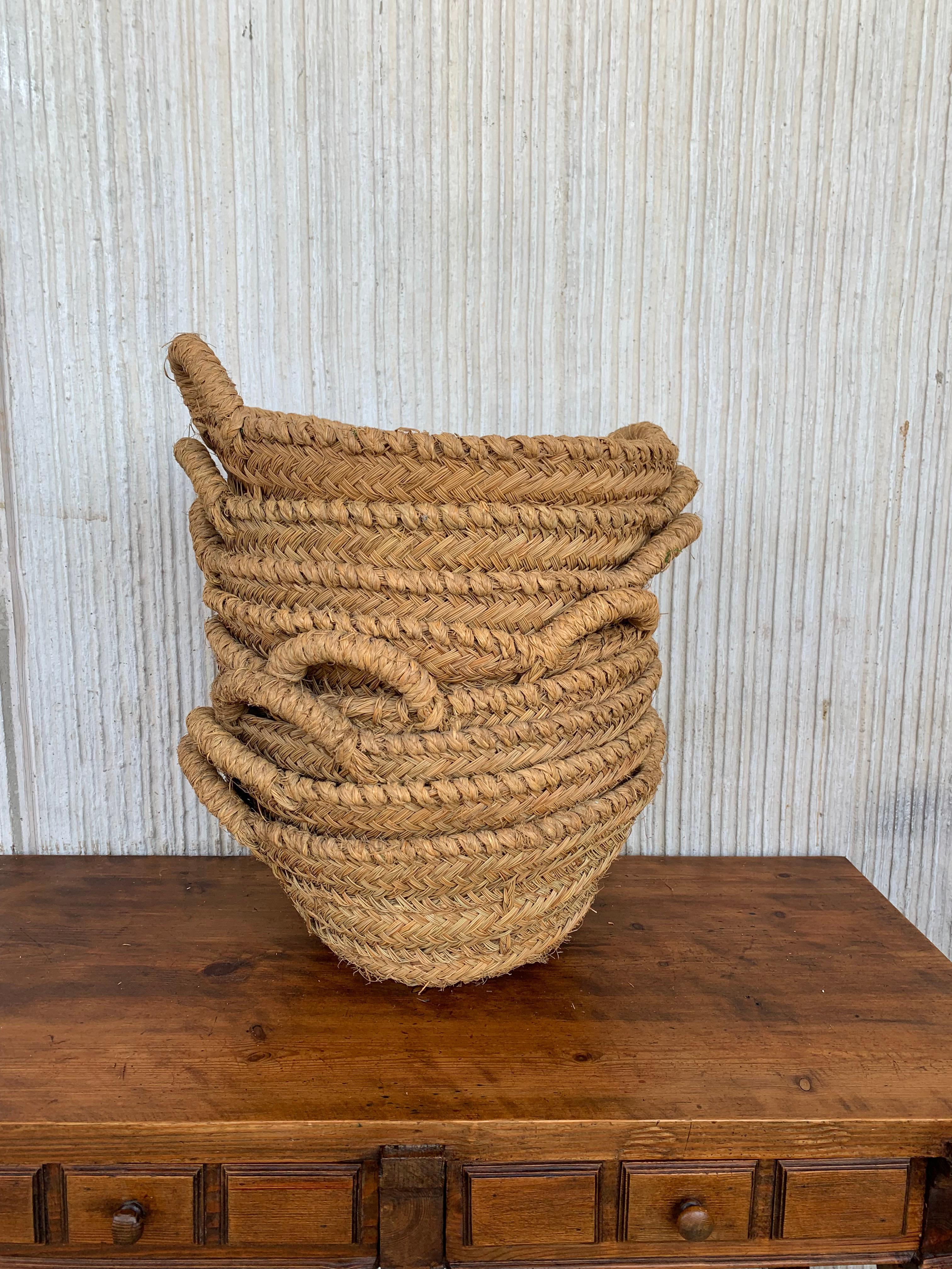 Spanish Colonial Set of 8 Spanish Woven Wicker Olive Grape Harvest Basket For Sale