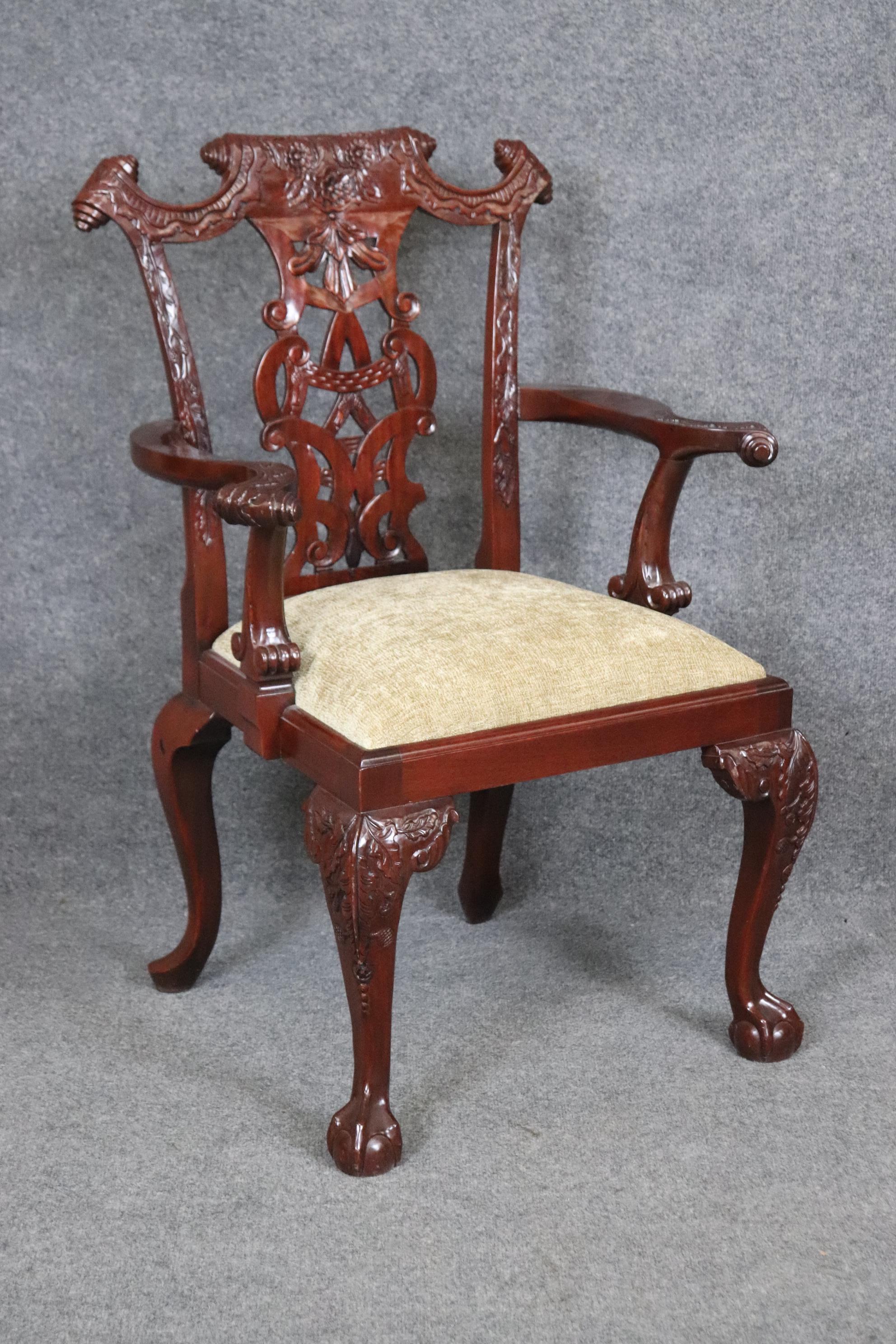 This is a gorgeous set of carved Chippendale style dining chairs. The chairs are in good condition and have minor s of age and wear/ Measures 40.5 tall x 27.5 wide x 22 deep and seat height of 20 inches. They are American made and date to the 2000s