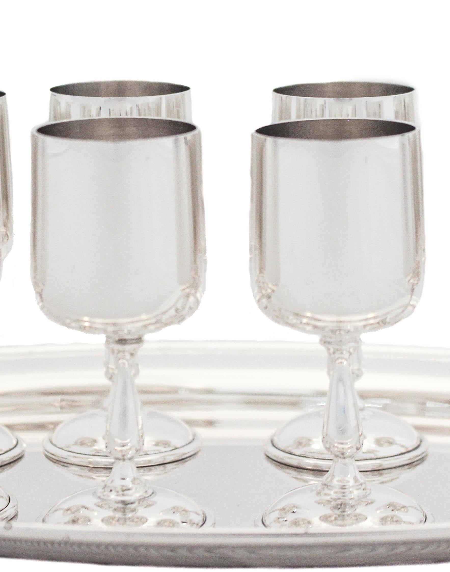 Being offered is a set of eight sterling silver cordials by Baldwin Miller Silver and a Gorham Silversmith tray to put them on. It’s a sleek and classic look; understated and sophisticated. Works with any decor and timeless. Cheers!!.