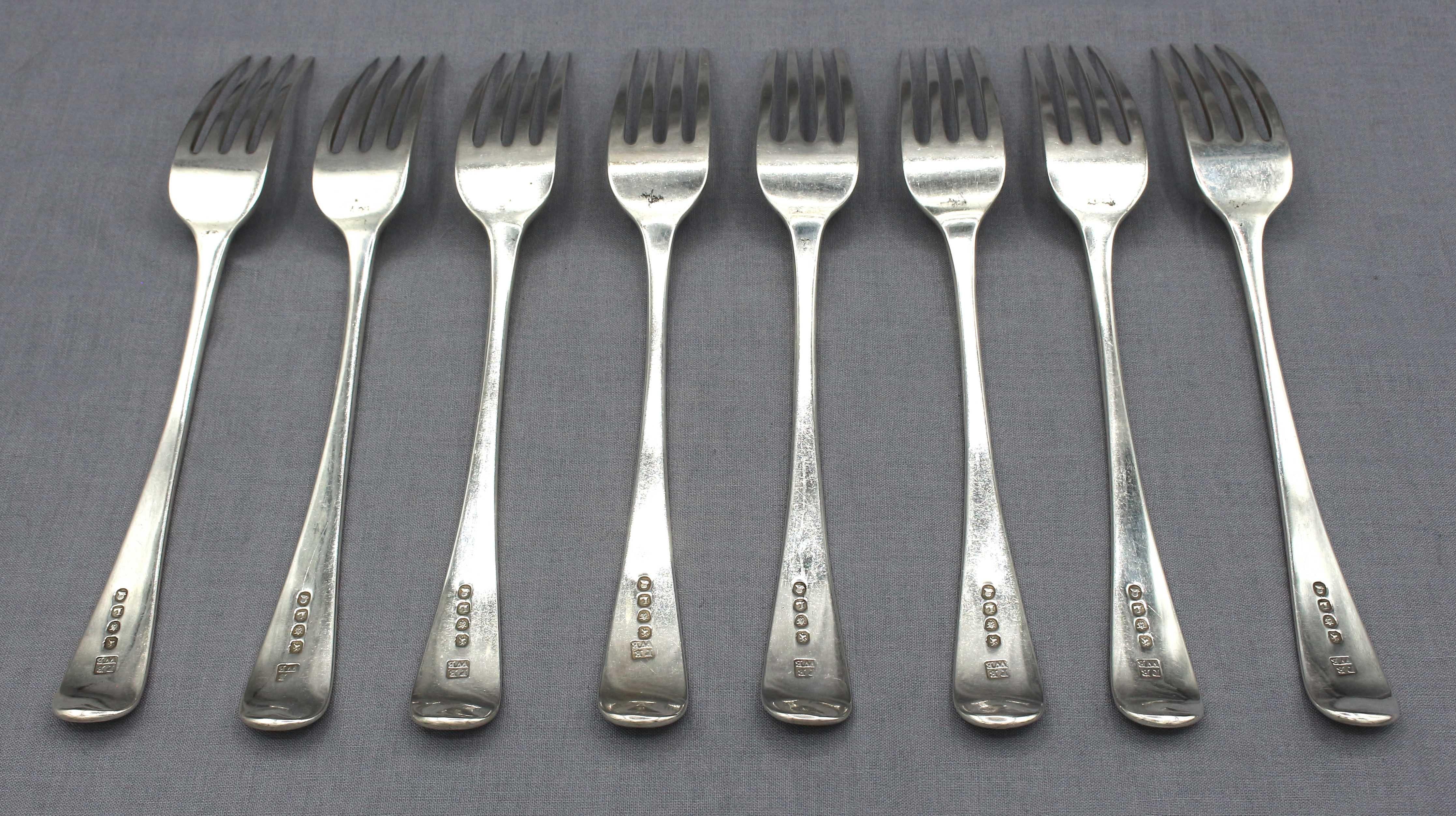 Set of 8 sterling silver dinner forks by Peter & William Bateman, London, 1806. The son and grandson of Hester Bateman. 4-tine forks. Each with crest of a bull passant issuing from a forest. 15.65 troy oz.
8 1/8